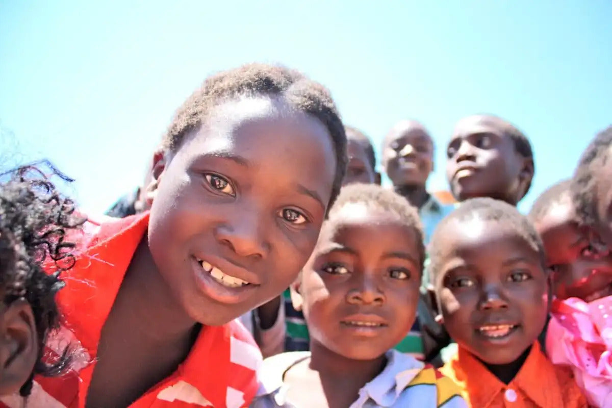 A group of children posing for a photo