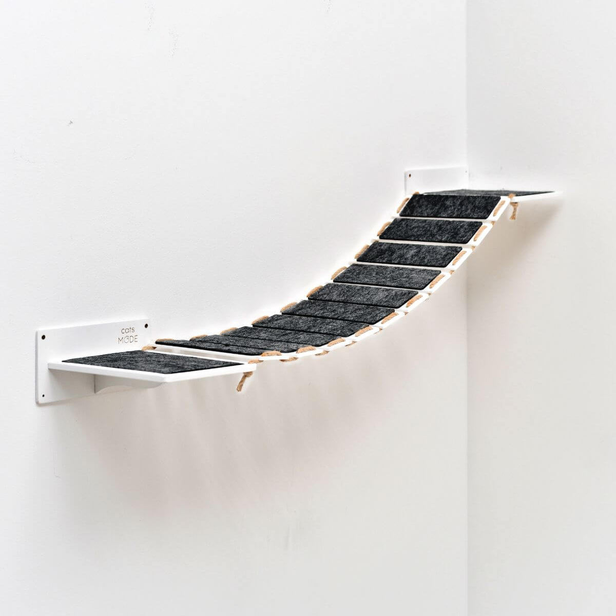 elevated cat walkway in white color covered with black felt