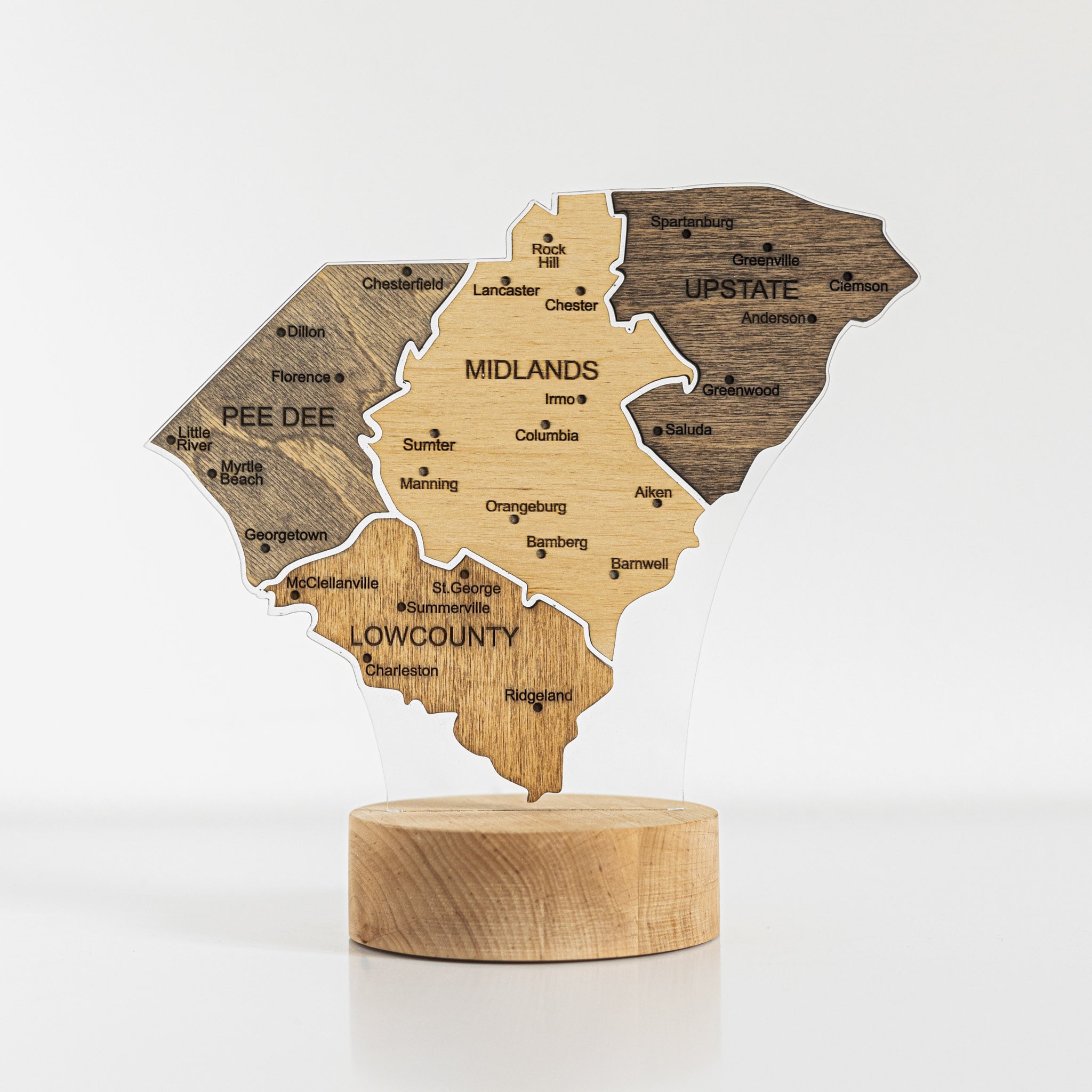 Wooden map of South Carolina on a white background