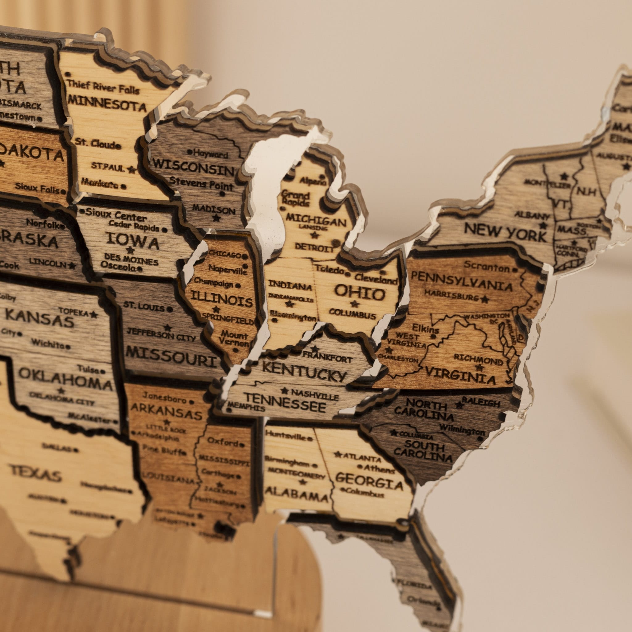 Wooden map of the United States with state names