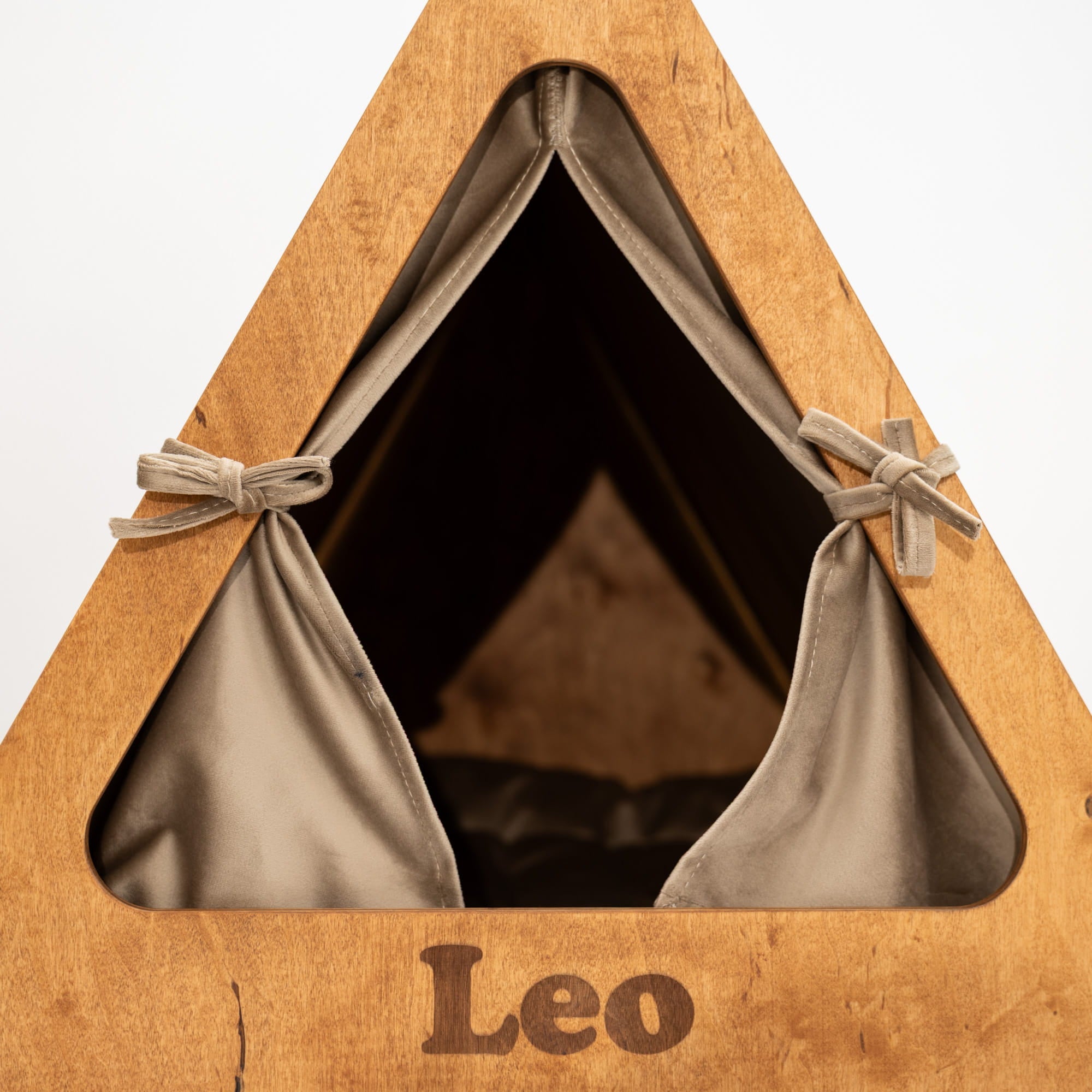 Brown pet teepee with 'Leo' branding on a white background