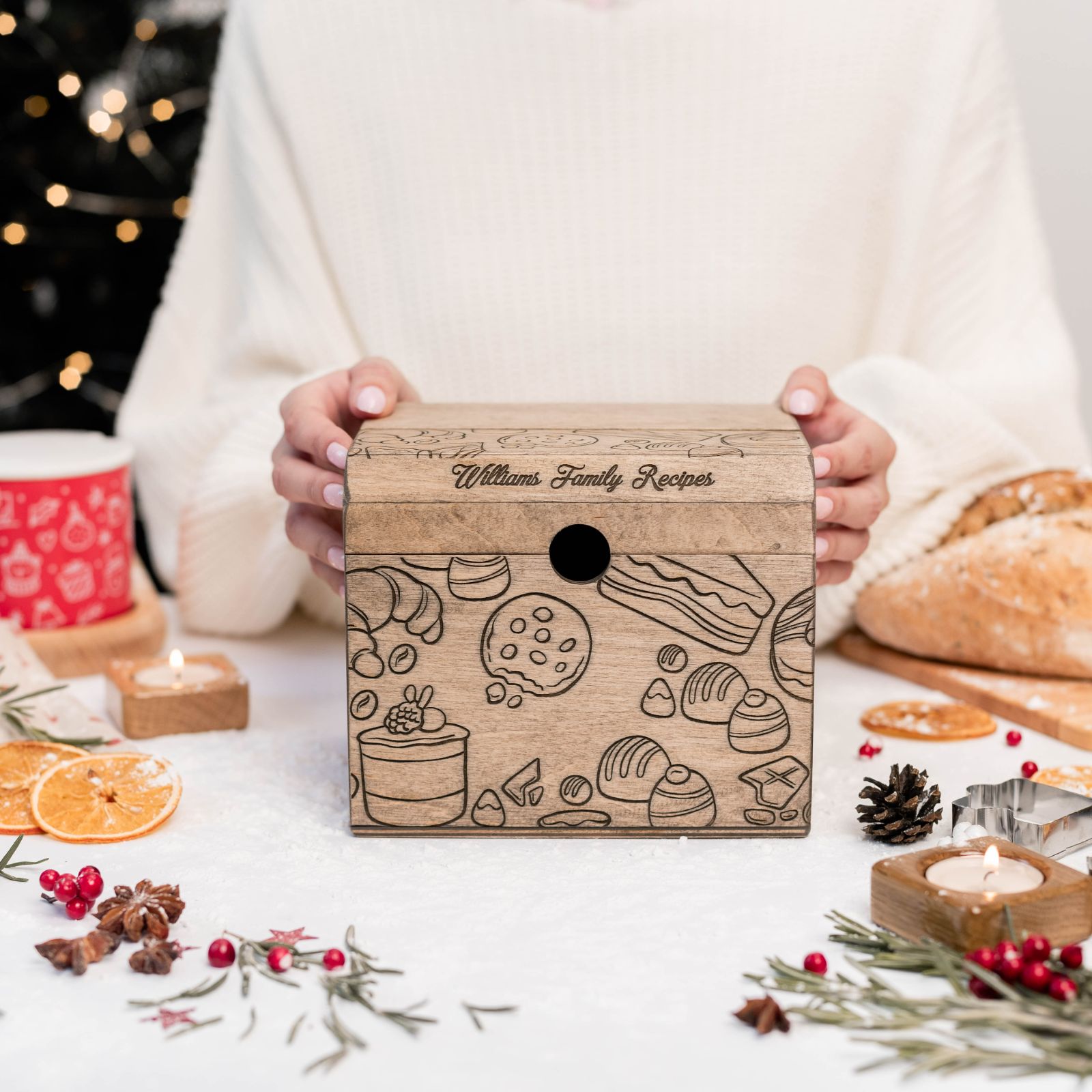 Personalized wooden recipe box engraved with Williams Family Recipes and festive table decor