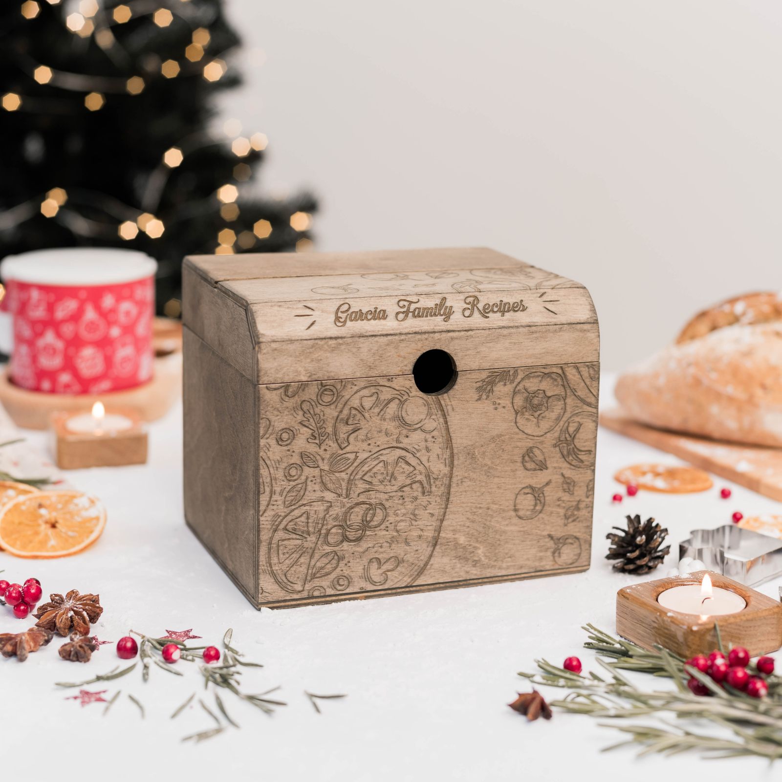 Wooden recipe box with detailed engraving on kitchen table