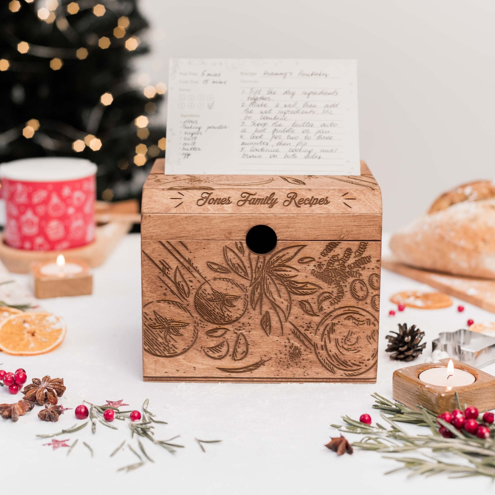 Personalized wooden recipe box with engraved family name and handwritten recipe card