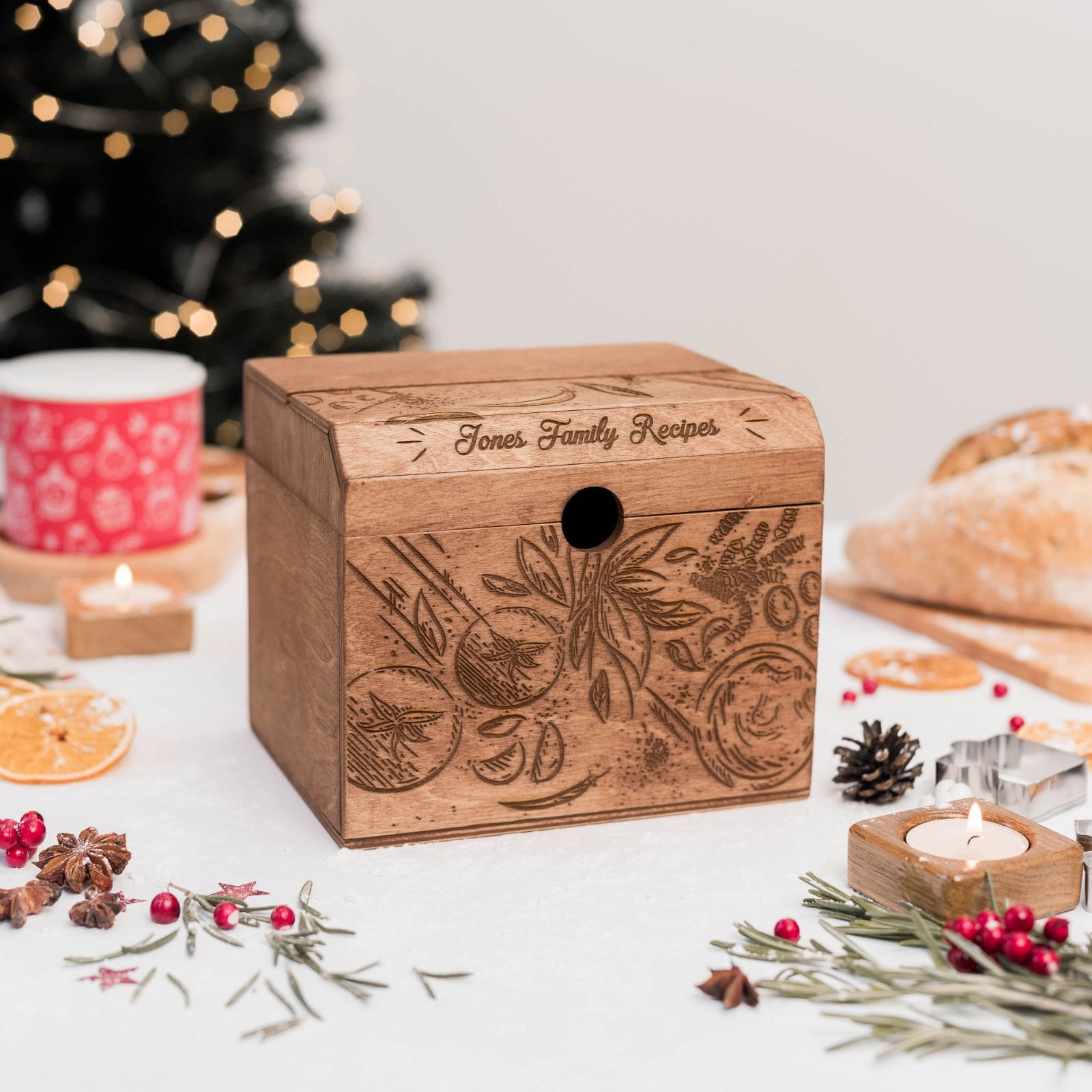 Personalized engraved wooden recipe box displayed on festive holiday table