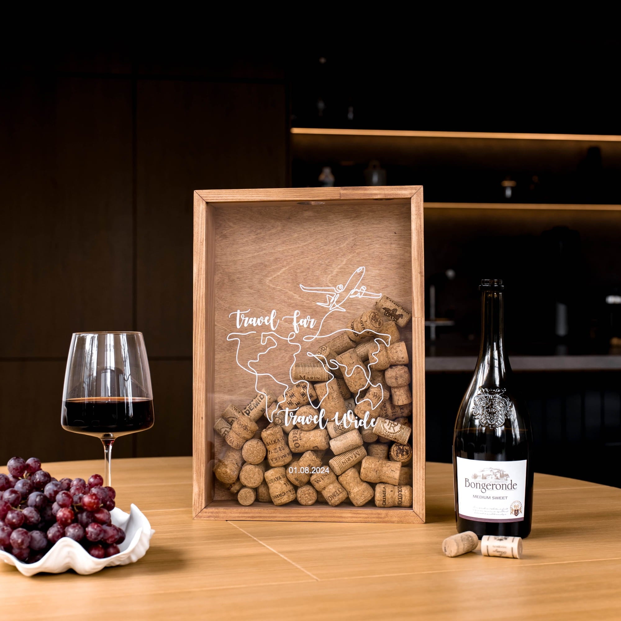 A personalized wooden wine cork tray with a clear front panel