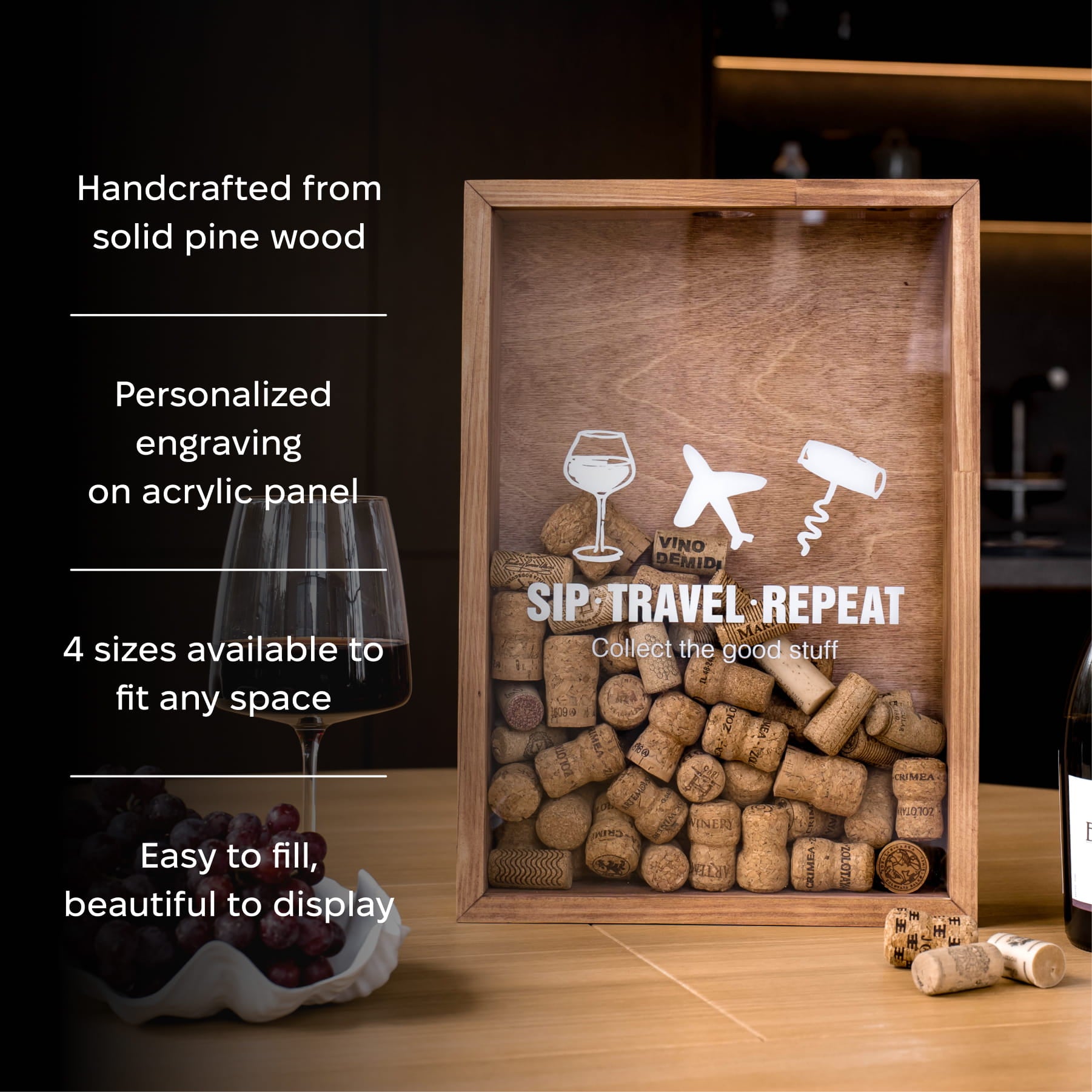 A rectangular pine wood-framed acrylic wine cork display box with a clear top panel