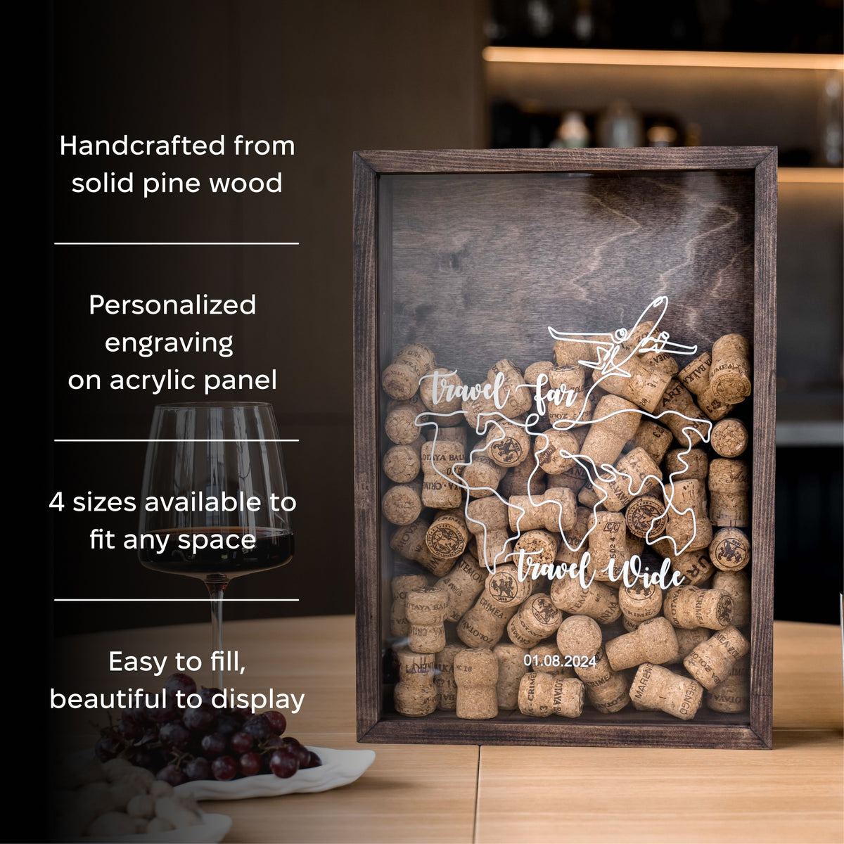 A personalized wooden shadow box display filled with wine corks