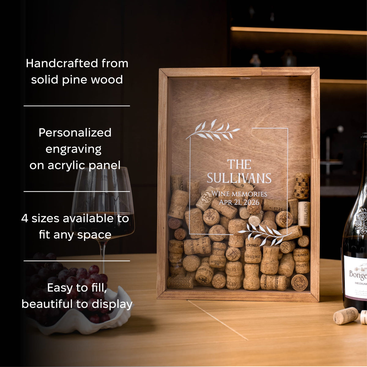A personalized wooden wine cork display box with an acrylic front panel