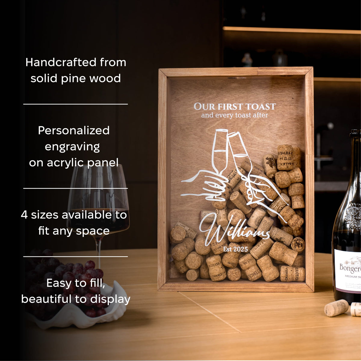 A personalized wooden wine cork display box with a clear acrylic front panel