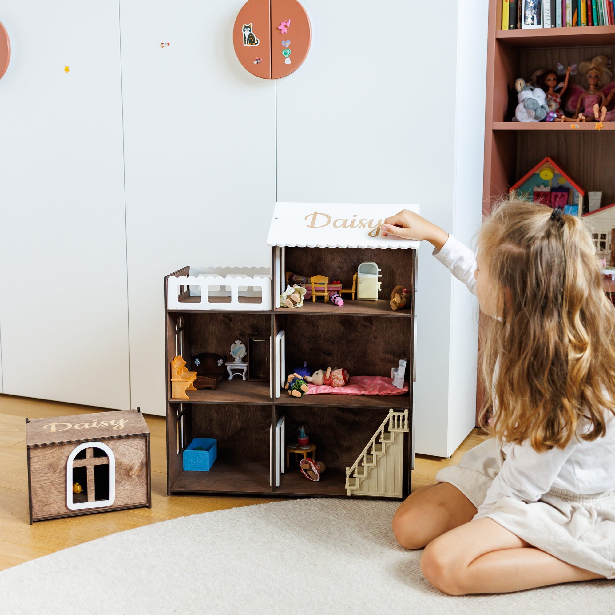 large dark brown wooden dollhouse
