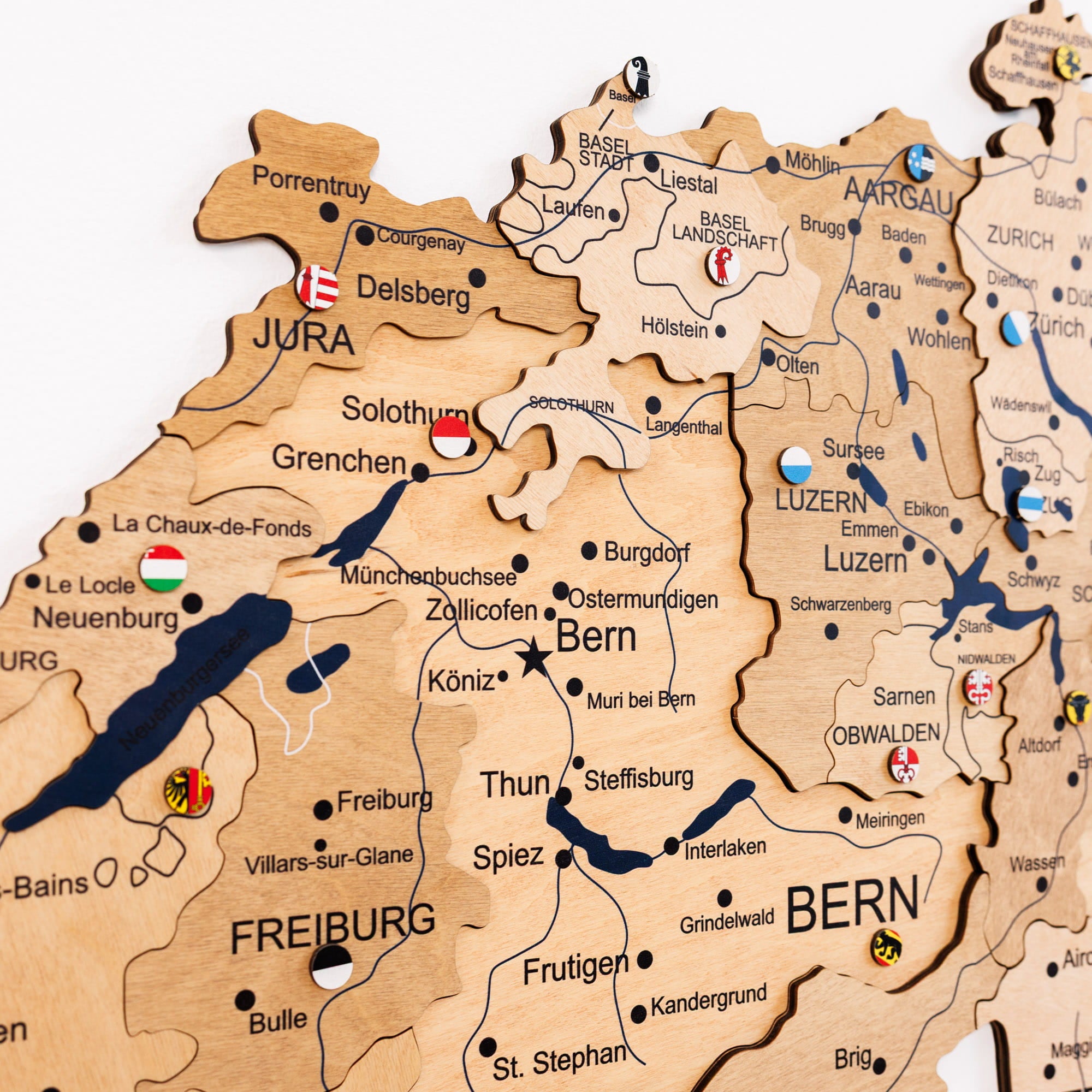 Wooden map of Switzerland with cities and flags