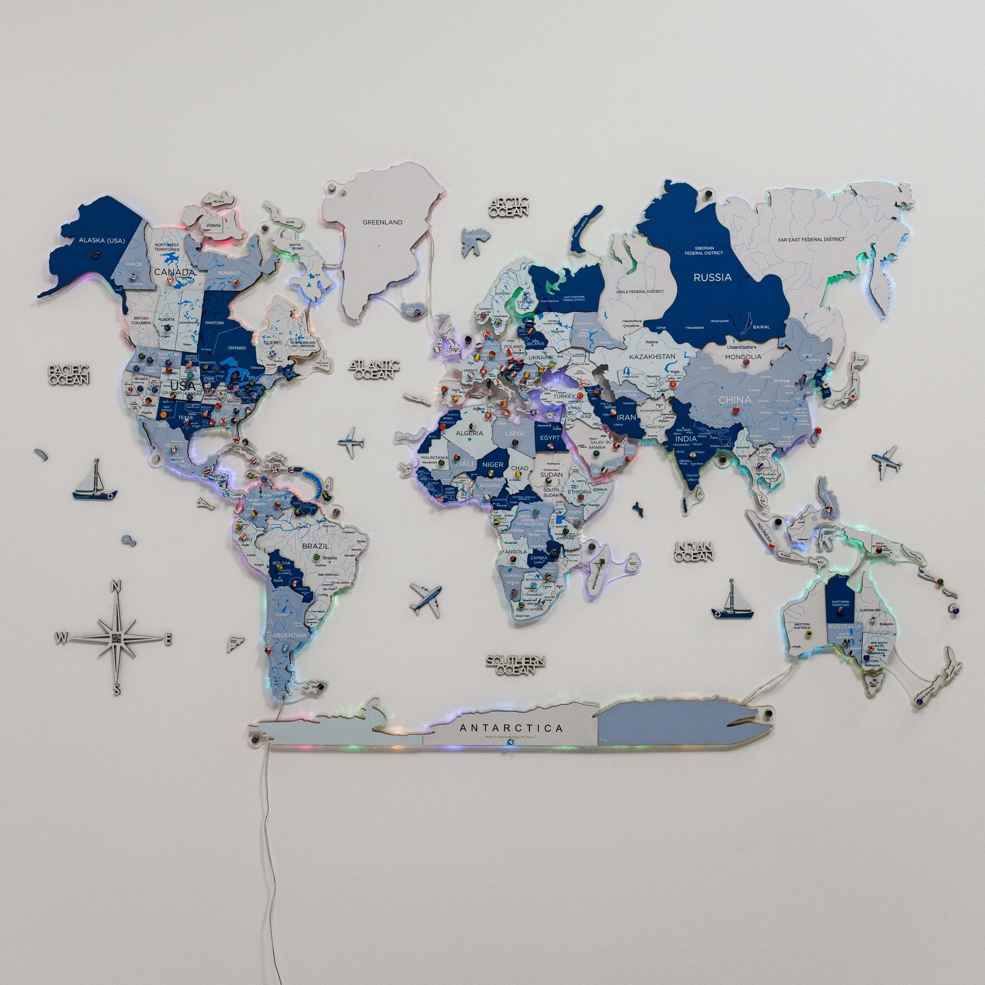 World map with various labels and icons on a light gray background