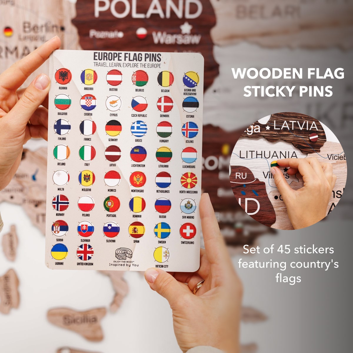 Set of 45 Europe flag sticky pins held by a hand with a map background.