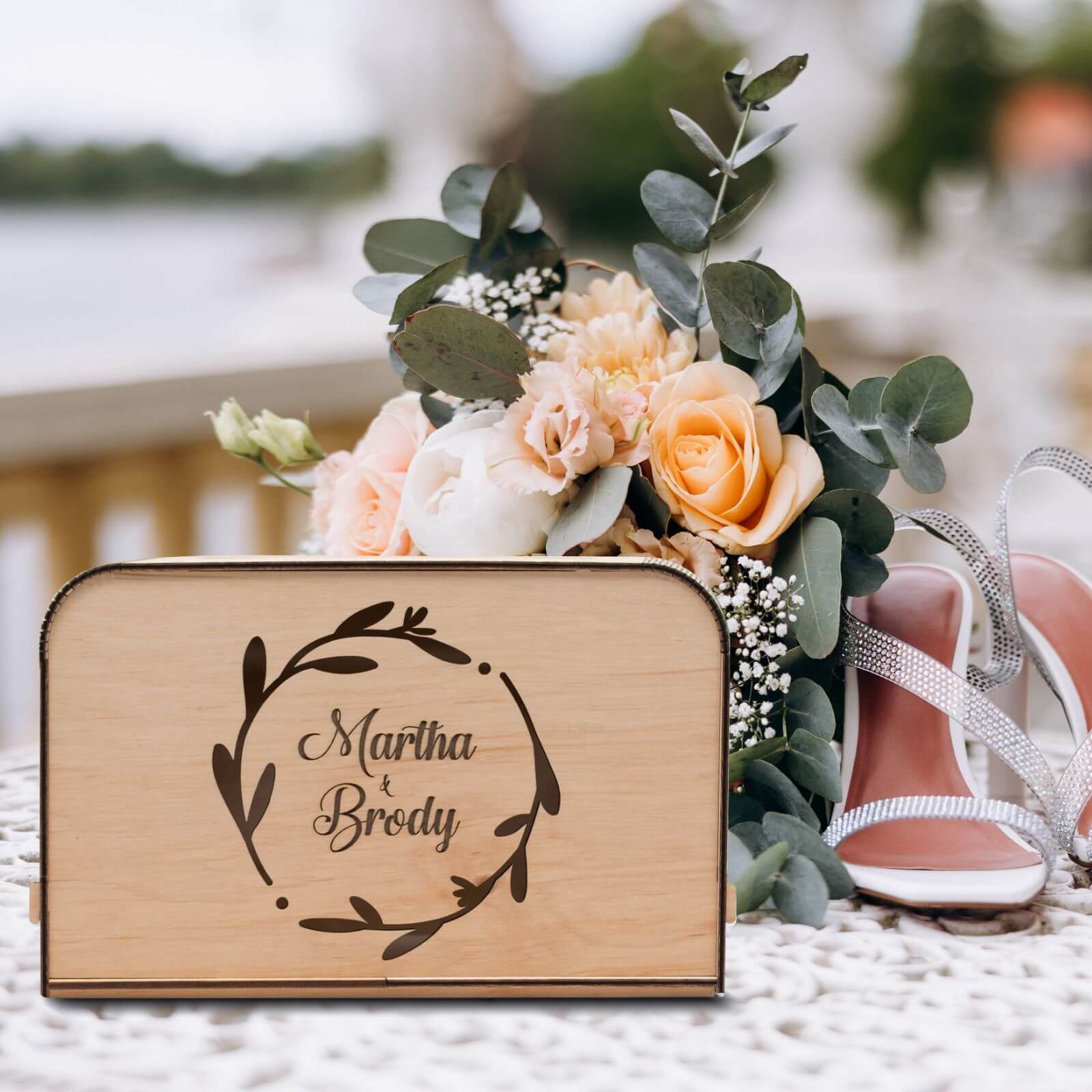 Custom wooden wedding card box with engraved names Martha and Brody, bridal bouquet and shoes decoration