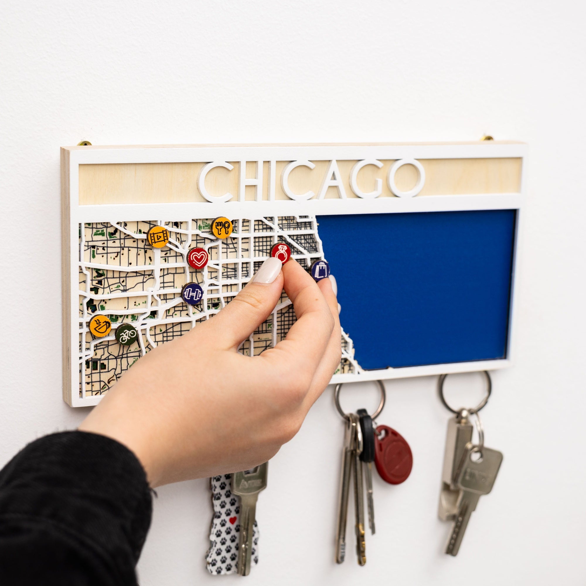 Key holder with 'Chicago' display and keys attached, on a white background