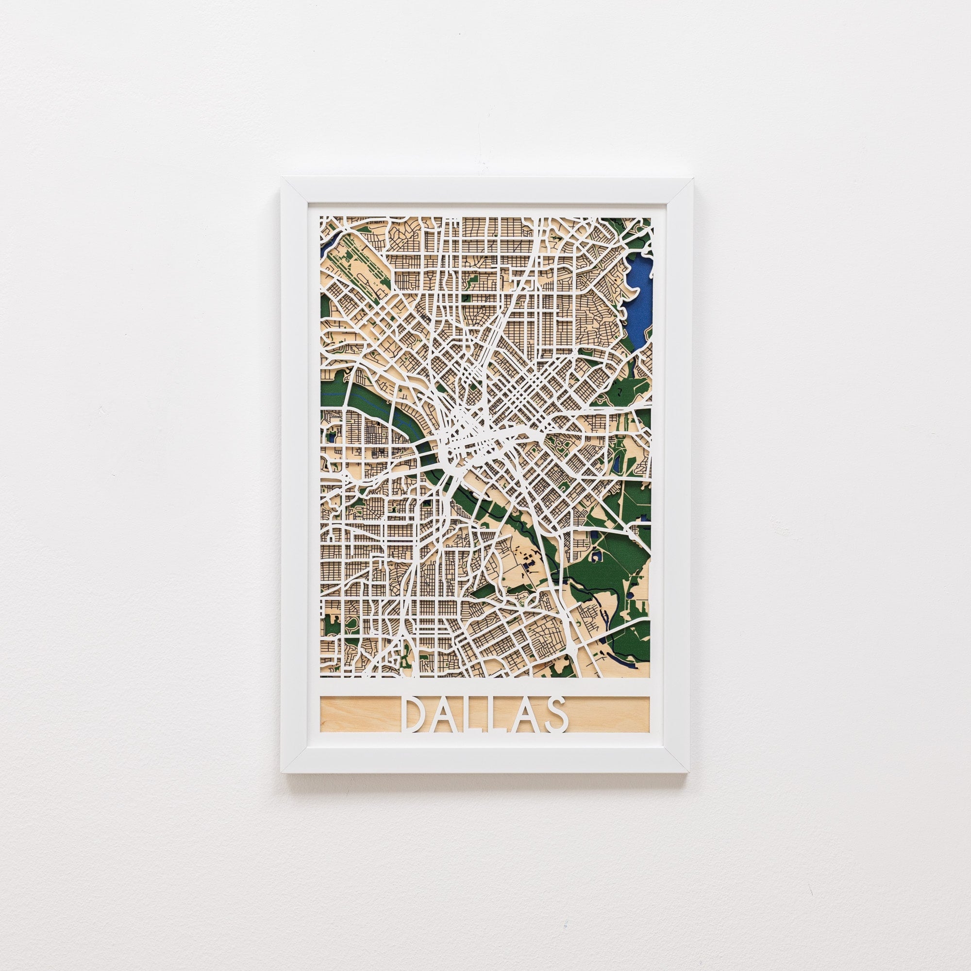 Framed map of Dallas on a white wall