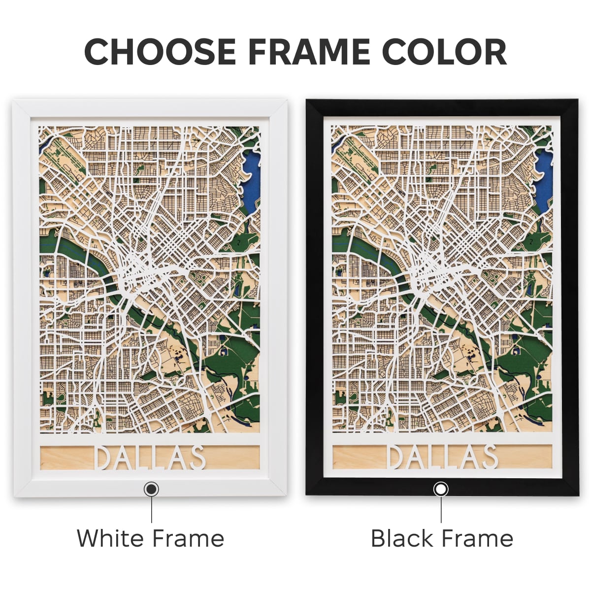 Woman hanging a framed map on a wall next to a wooden side table with books and a plant.