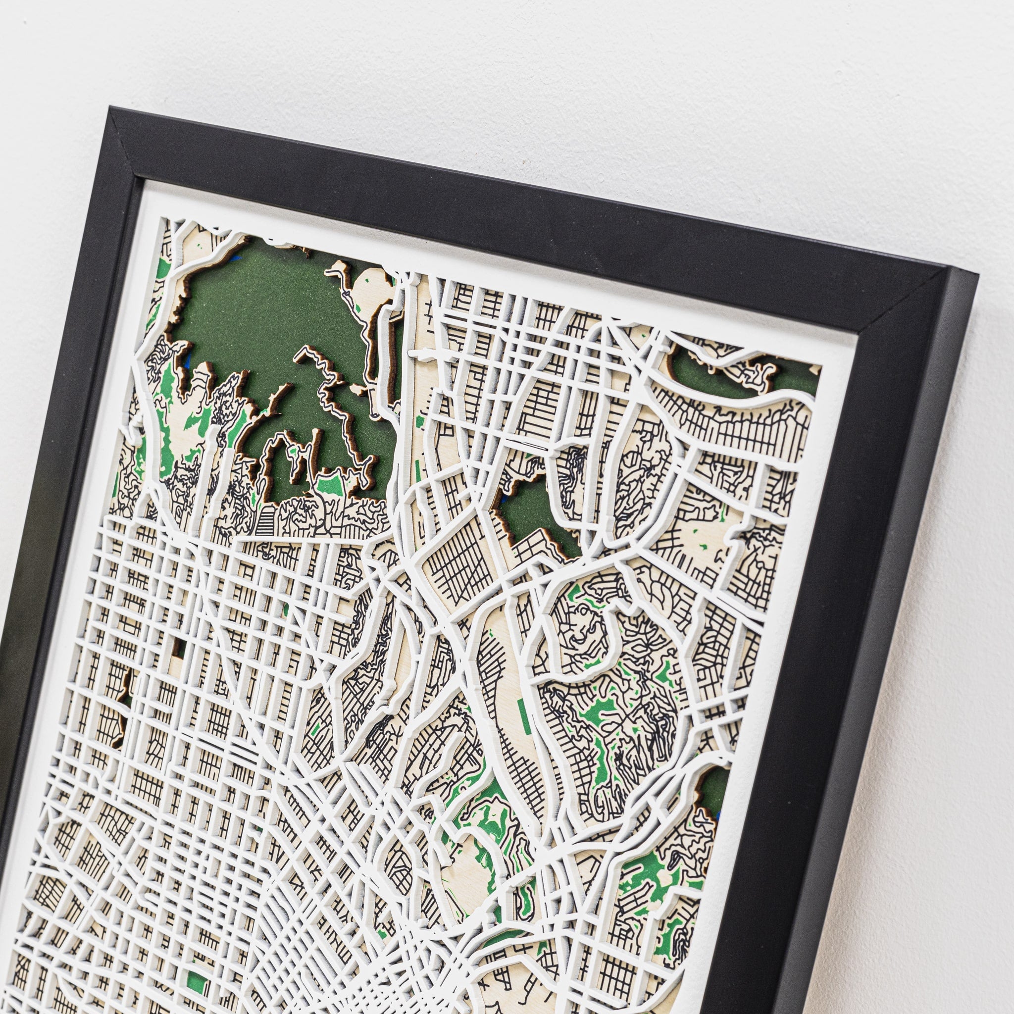 Framed city map with a black frame on a white background