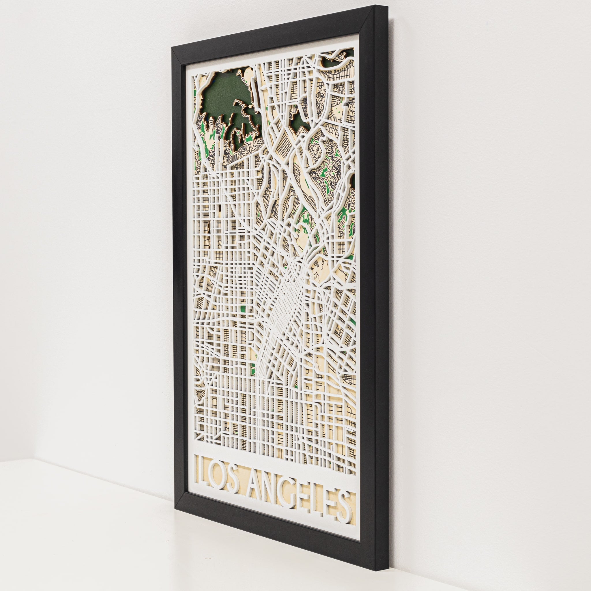 Framed city map of Montréal on a white wall