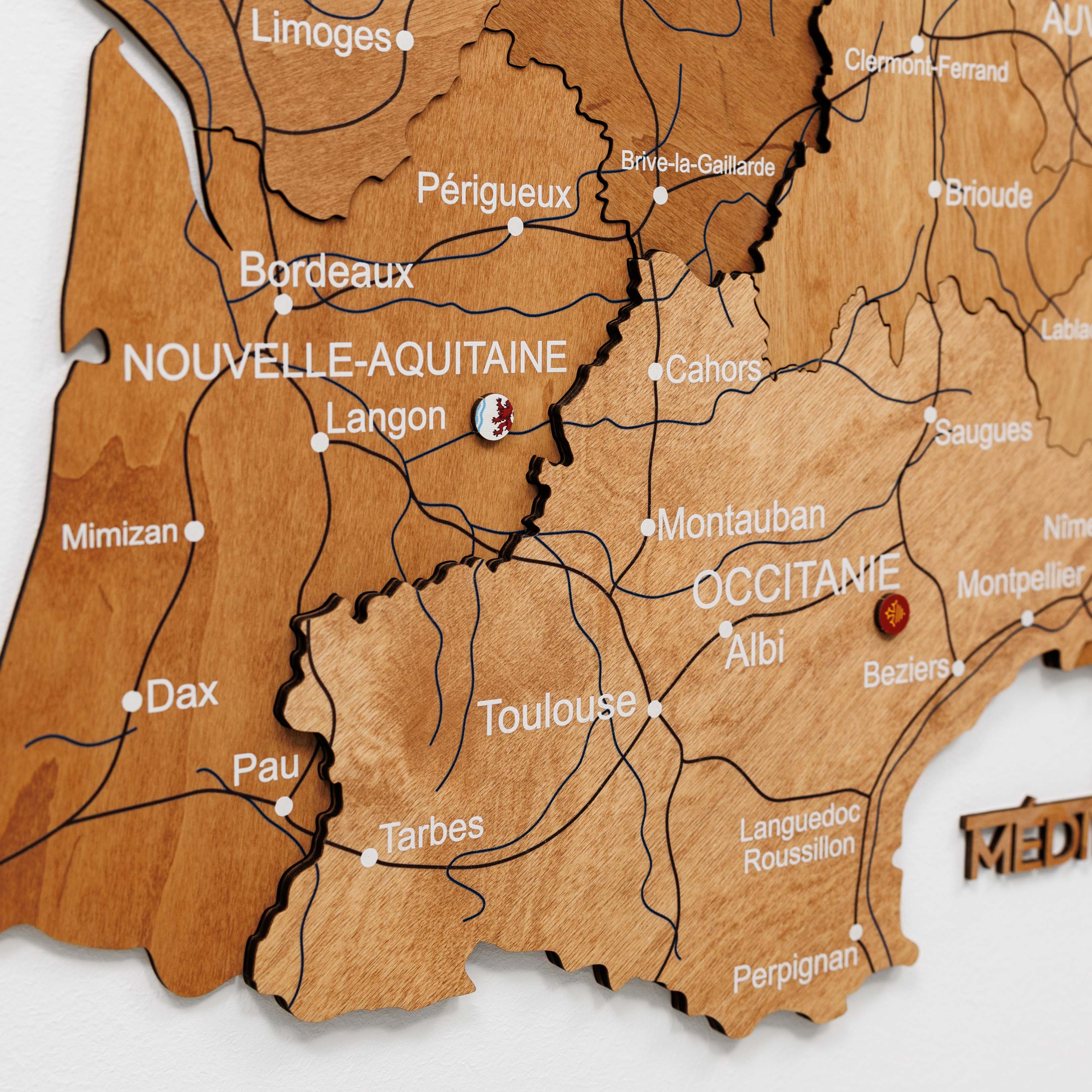 Wooden map of Nouvelle-Aquitaine and Occitanie regions with cities labeled