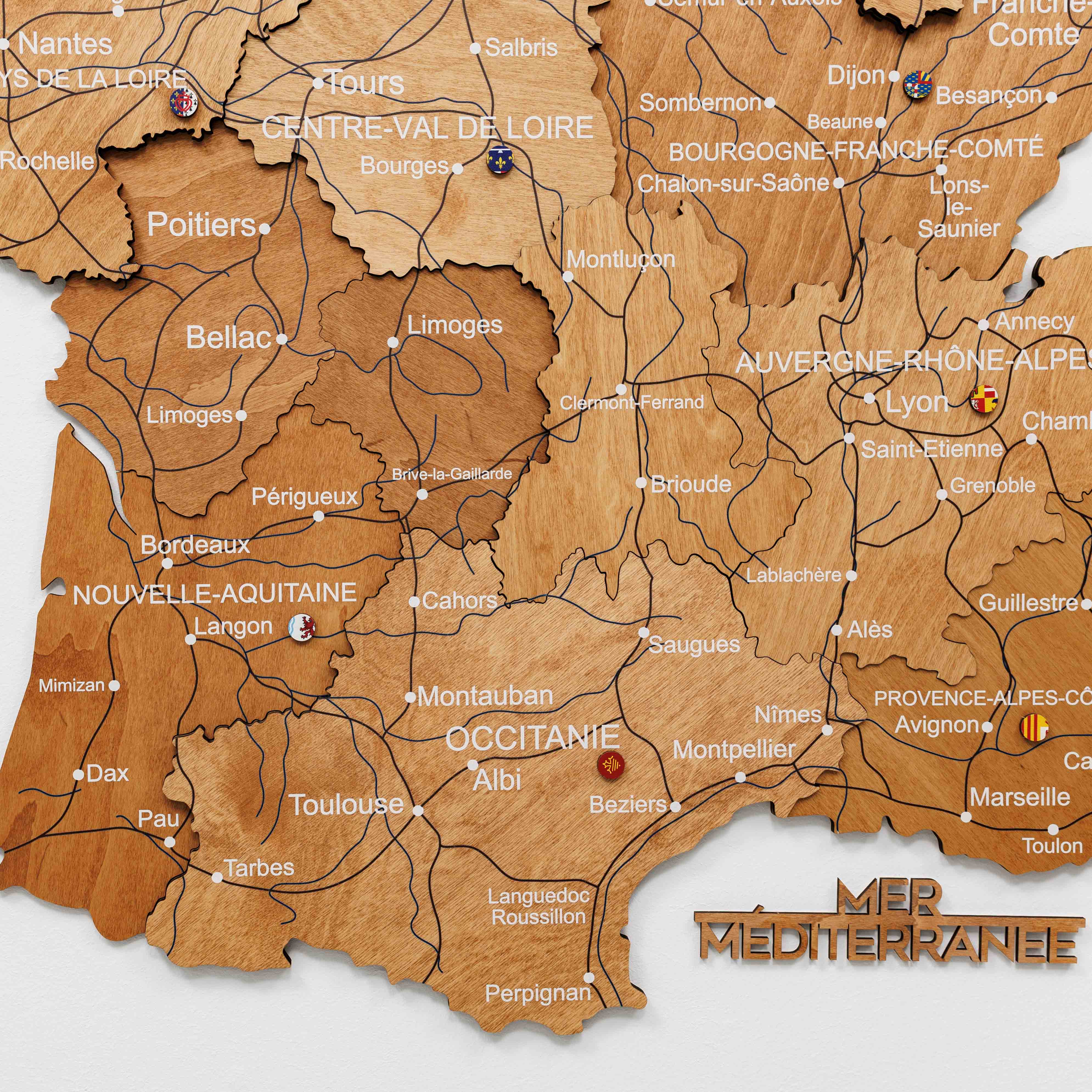 Wooden map of France with regions labeled