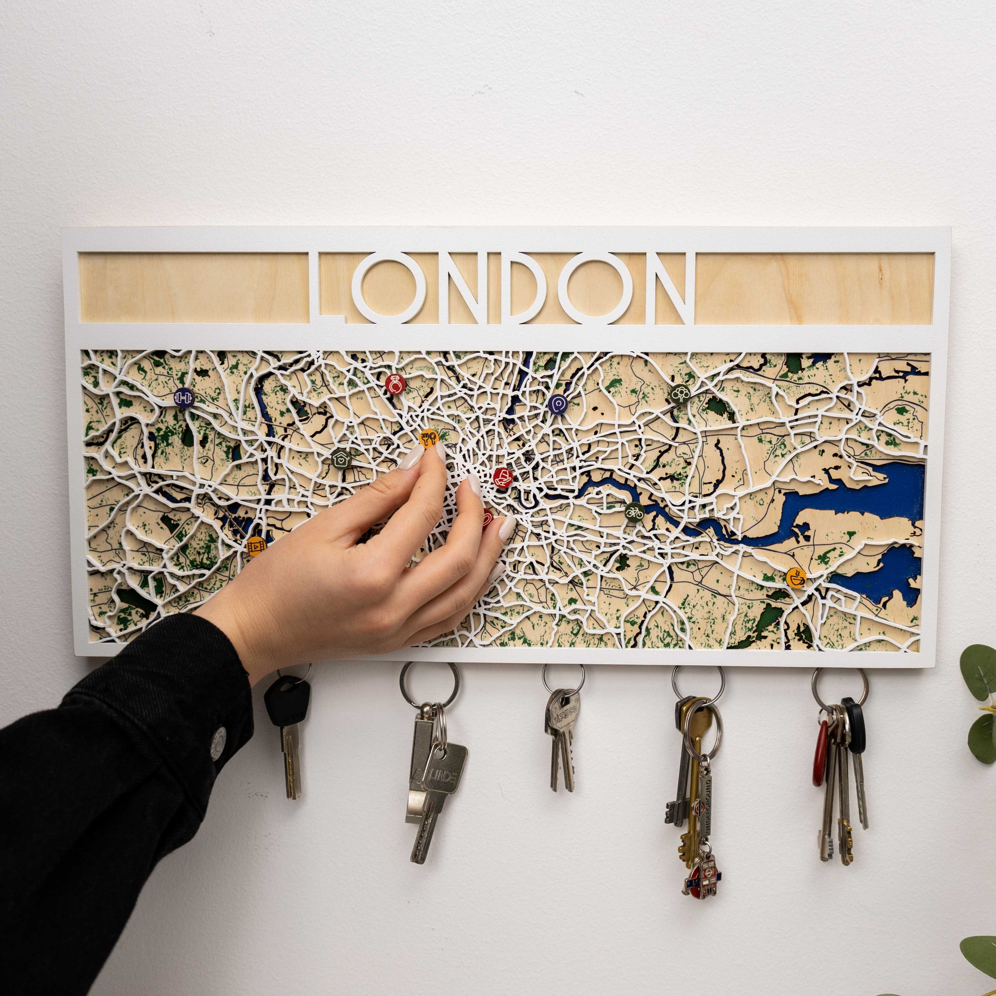 Key holder with London map design on a white wall