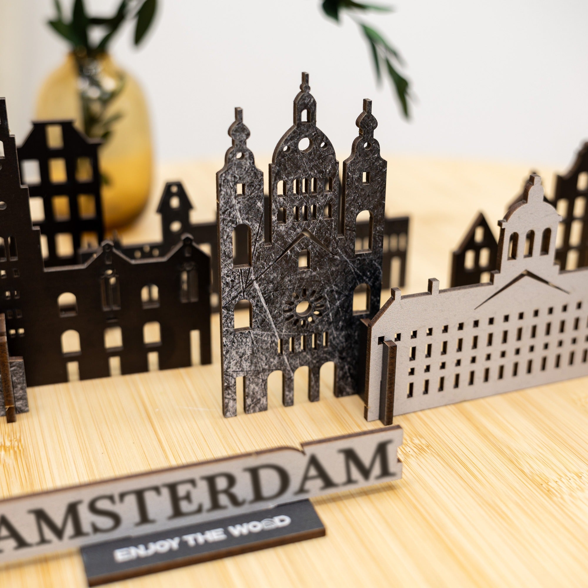 Model of Amsterdam buildings on a wooden base with 'Amsterdam' sign