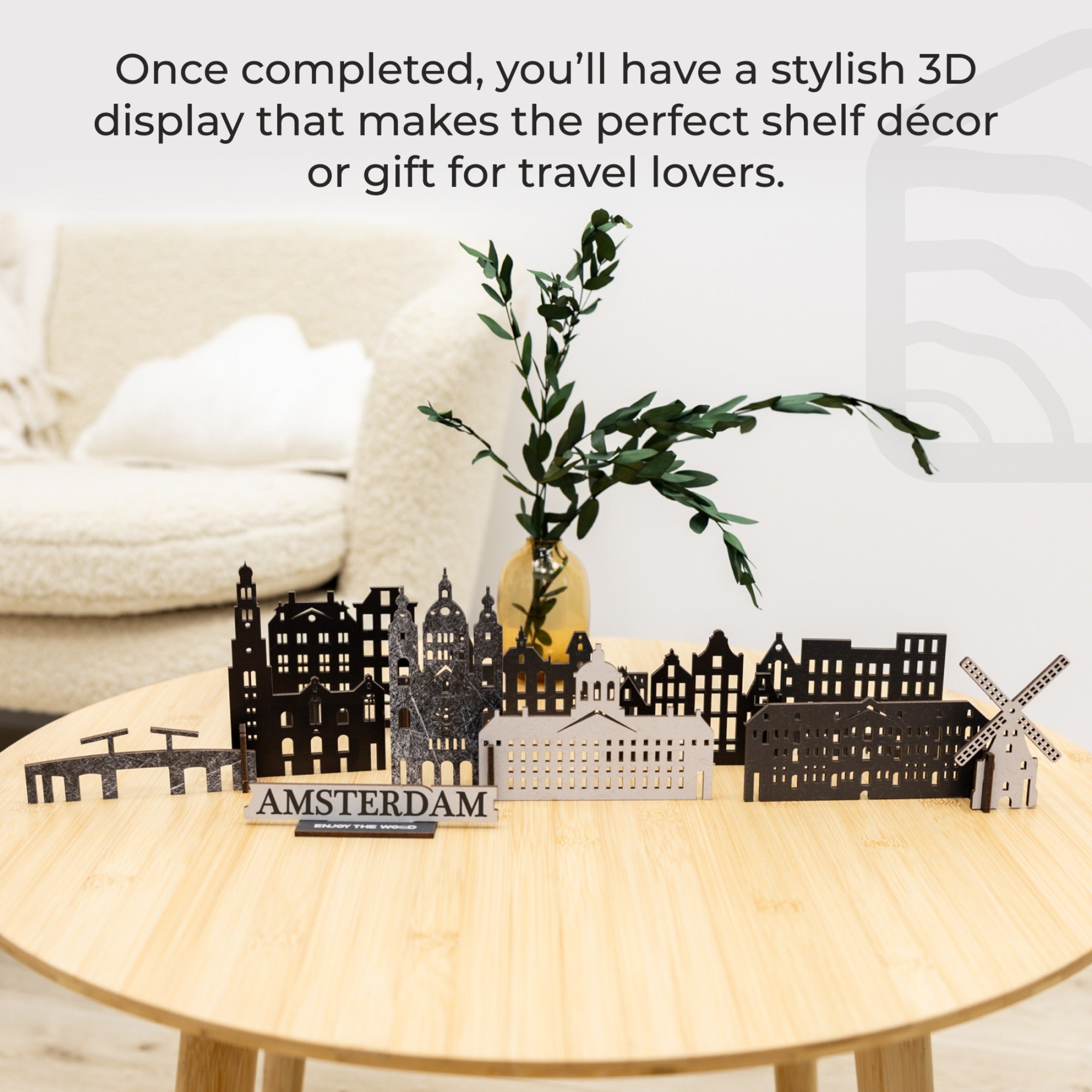 3D cityscape model on a table with text about its use as decor or gift.