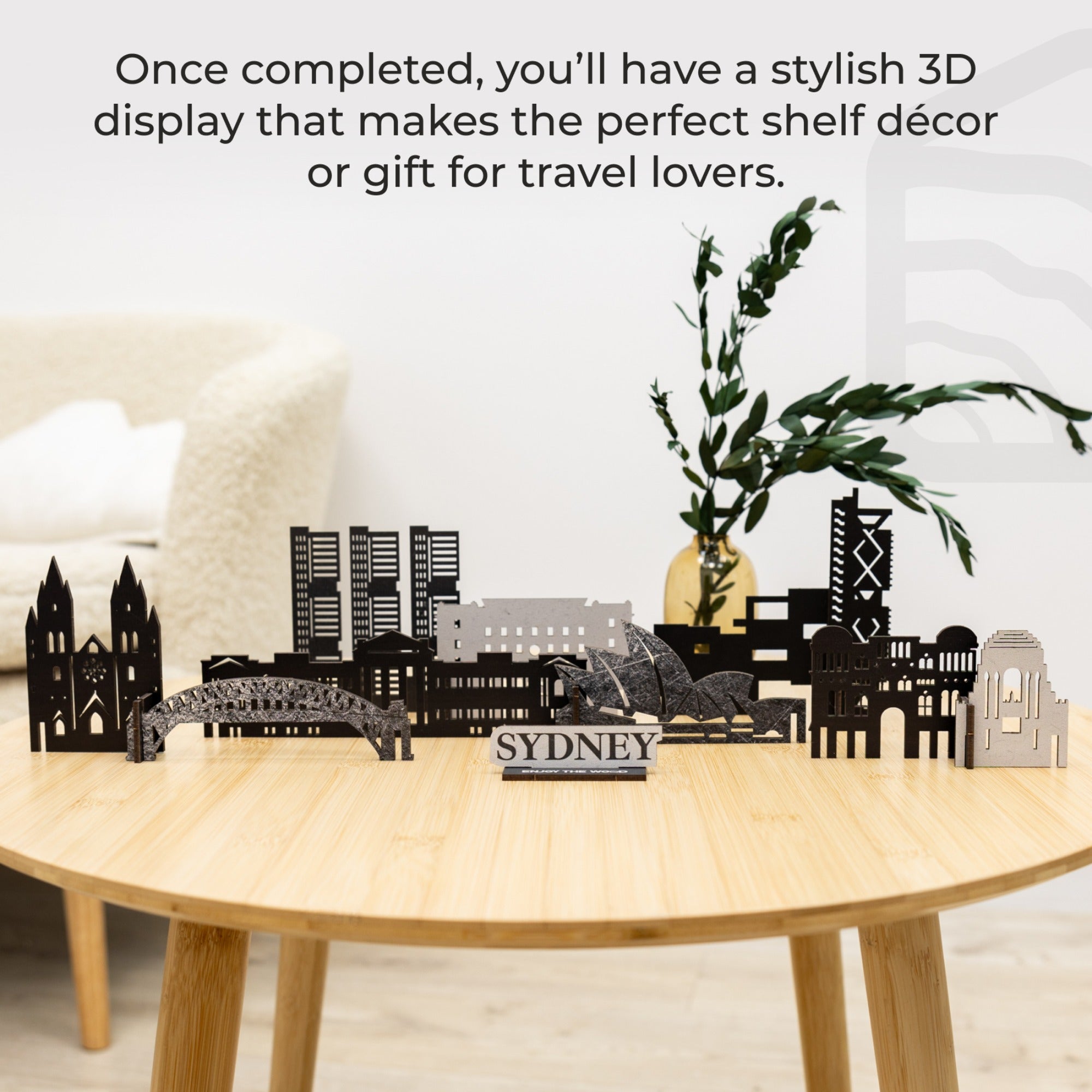 3D cityscape model on a table with text about travel lovers and shelf decor.