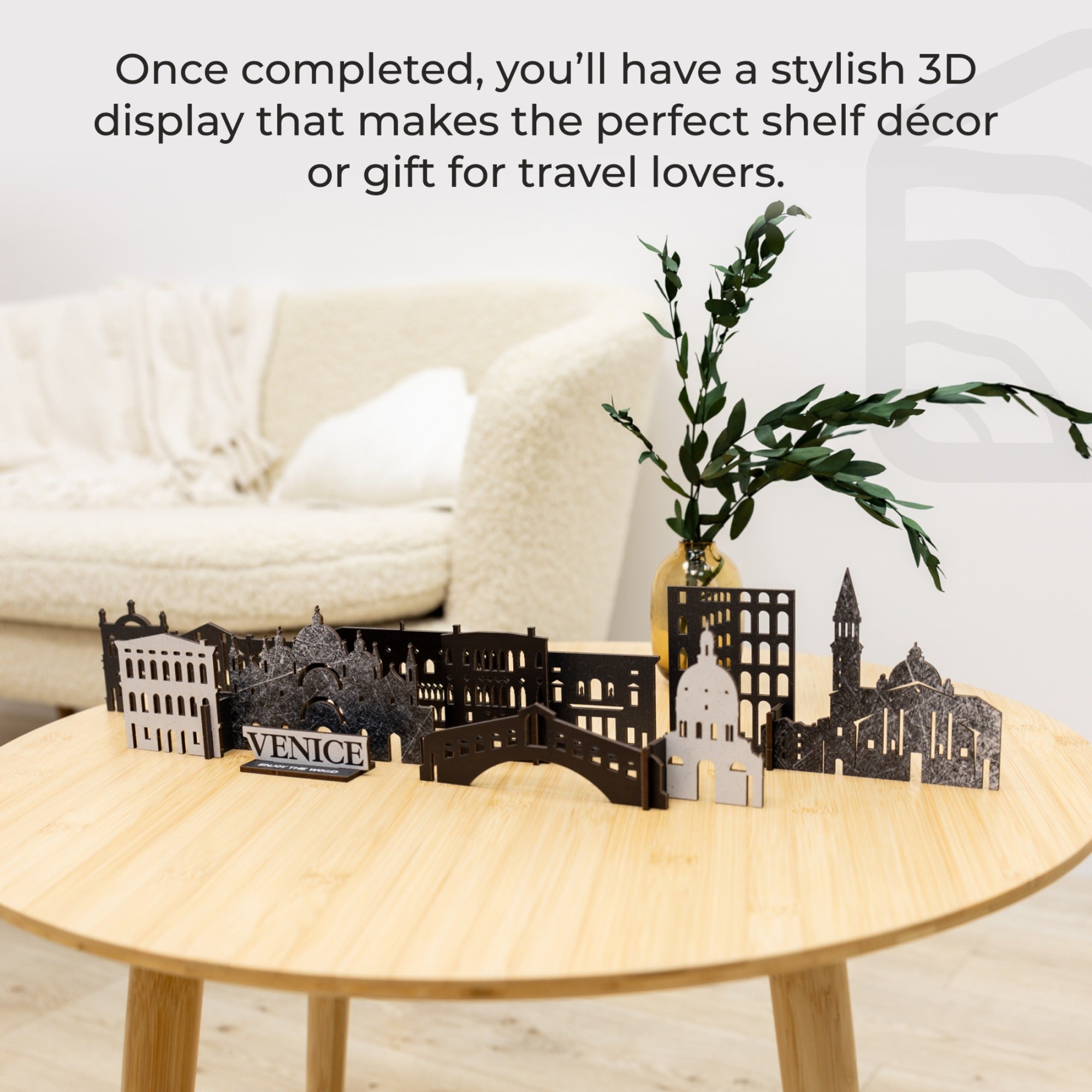3D cityscape model on a table with text about a stylish shelf decor or gift for travel lovers.