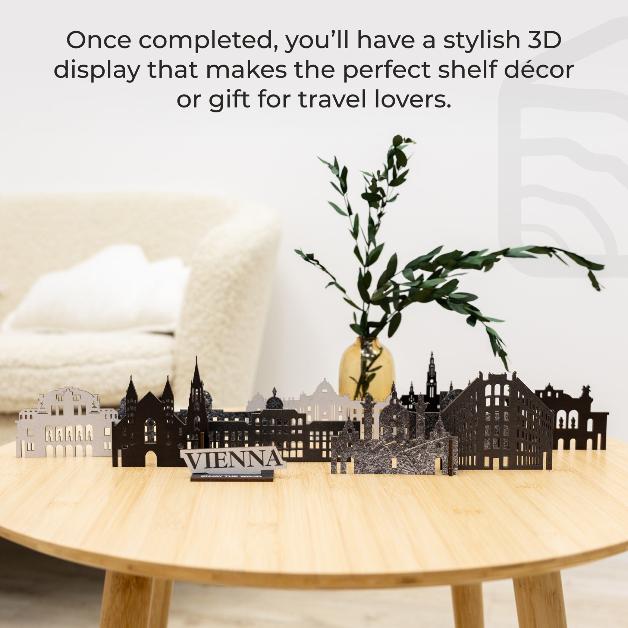 3D cityscape display on a table with text about travel lovers and decor.