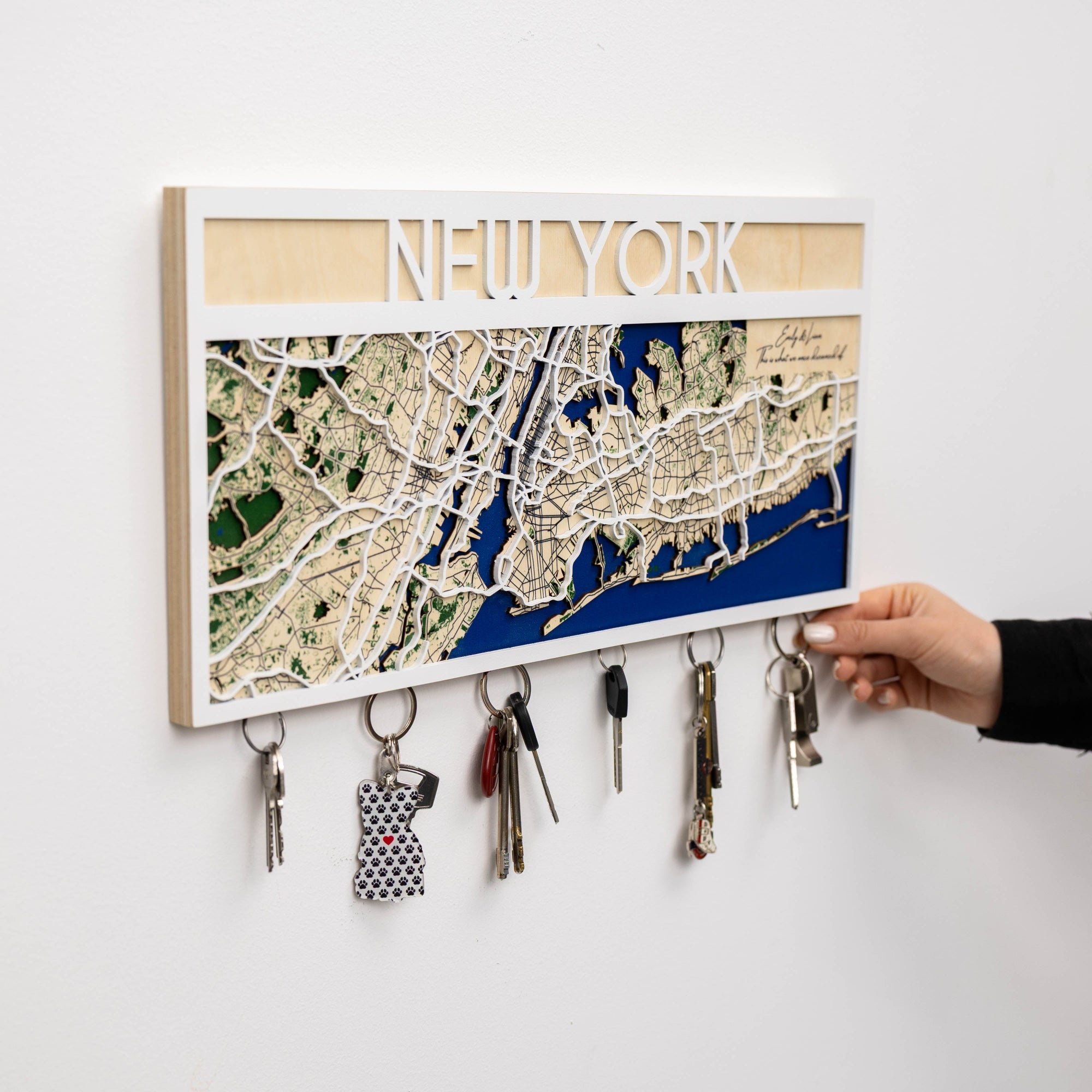 Key holder with New York map design on a white wall