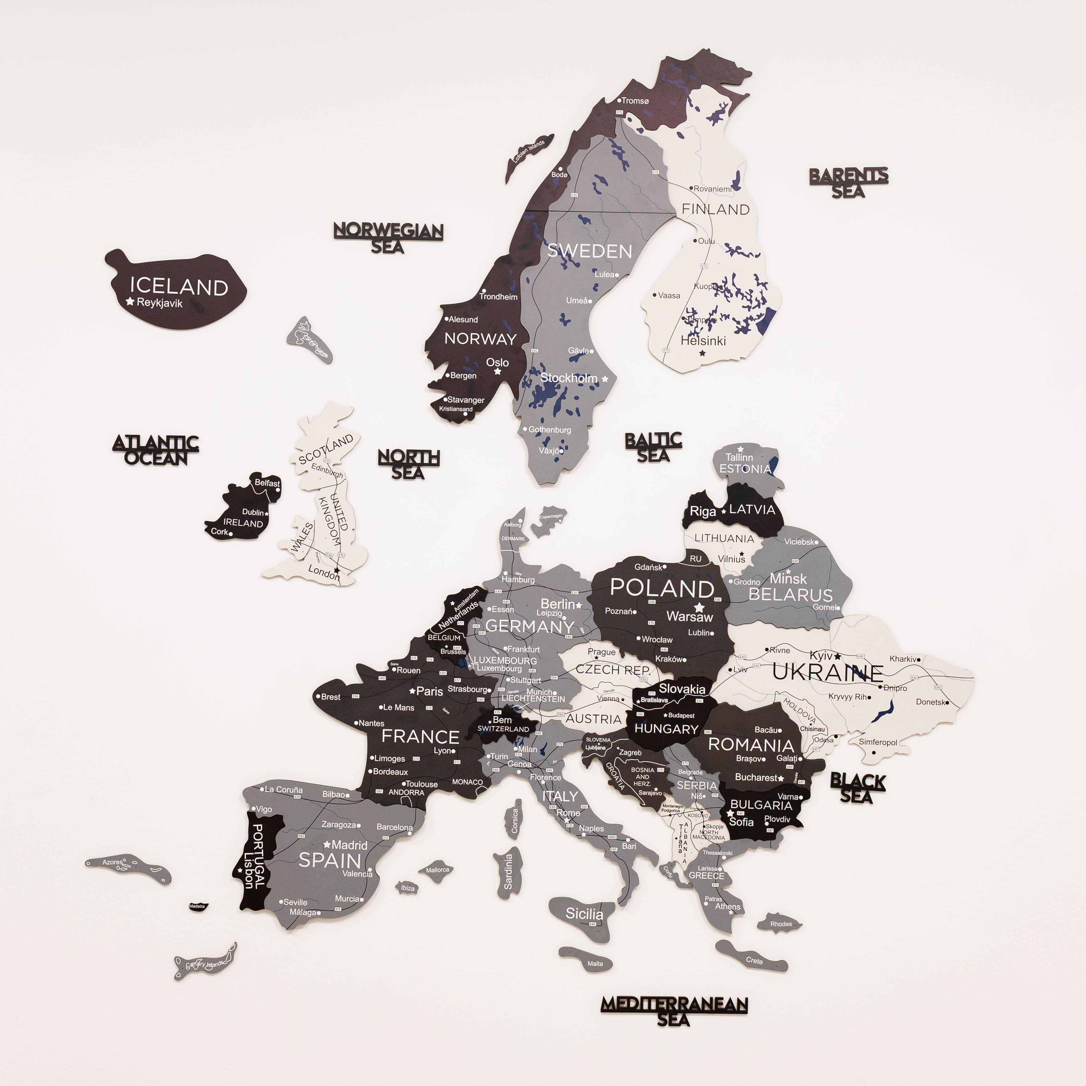 Map of Europe with country names and neighboring seas on a white background
