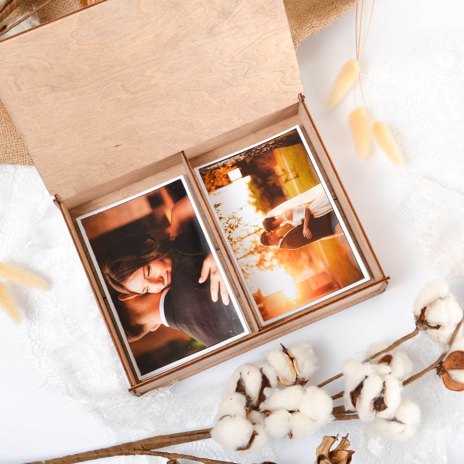 Rustic wooden box holding wedding prints and cotton decor