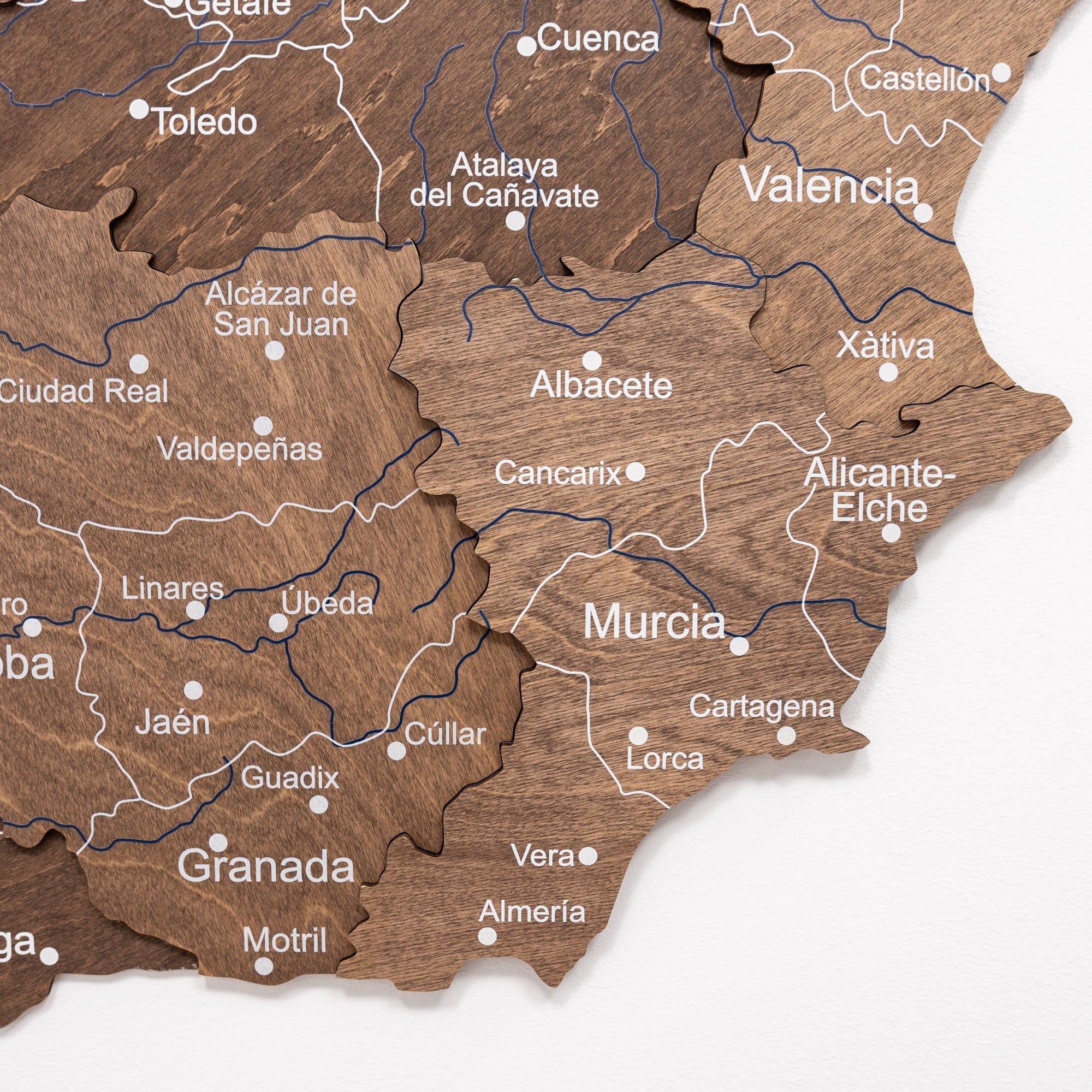 Wooden map of Spain with cities labeled