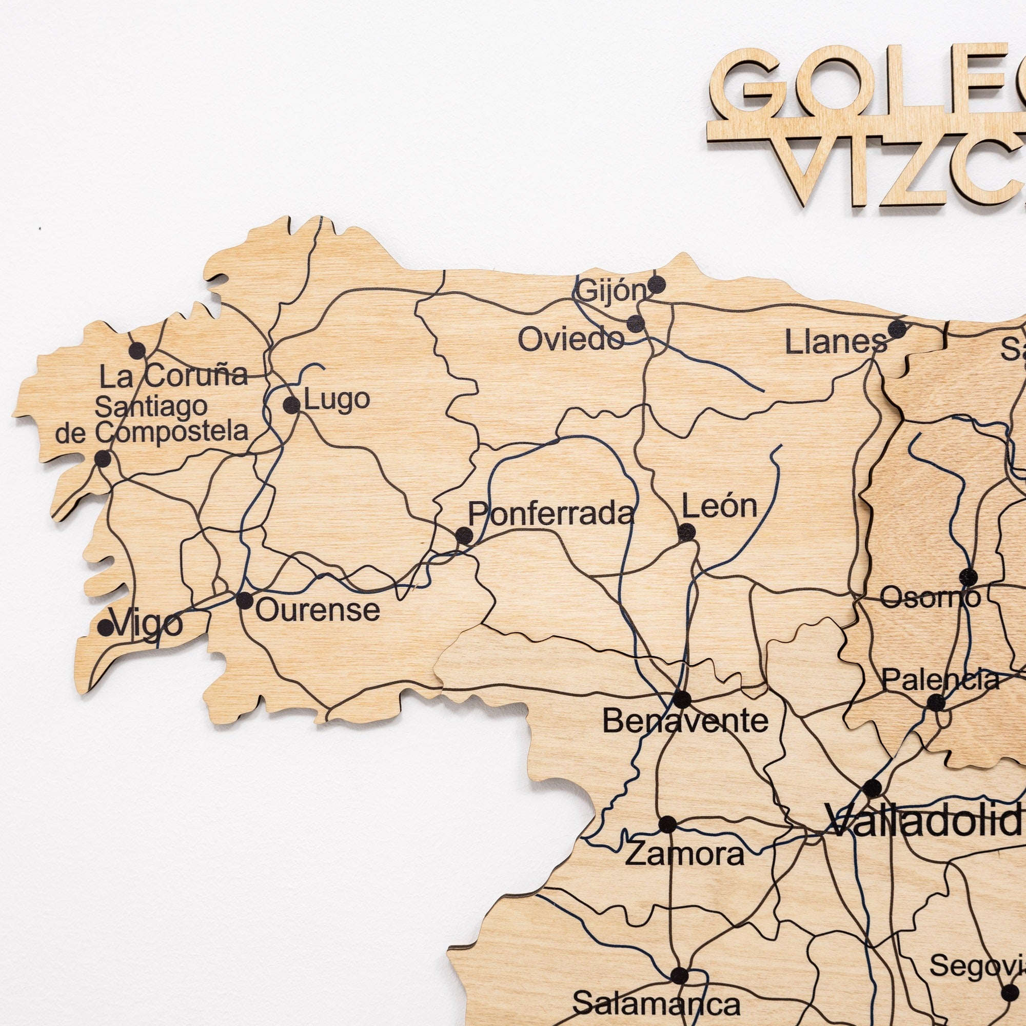 Wooden map of Spain with Gijón highlighted