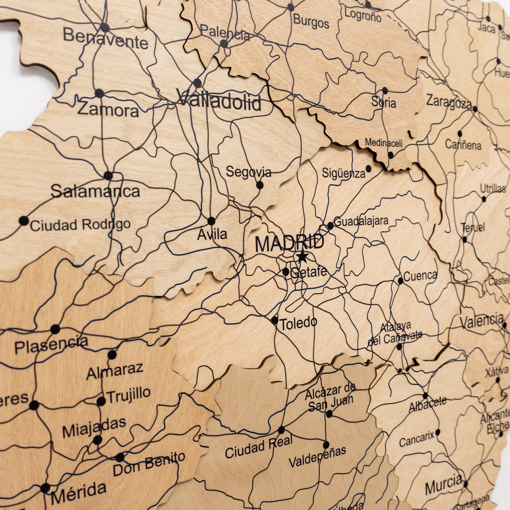 Wooden map of Spain with Madrid highlighted