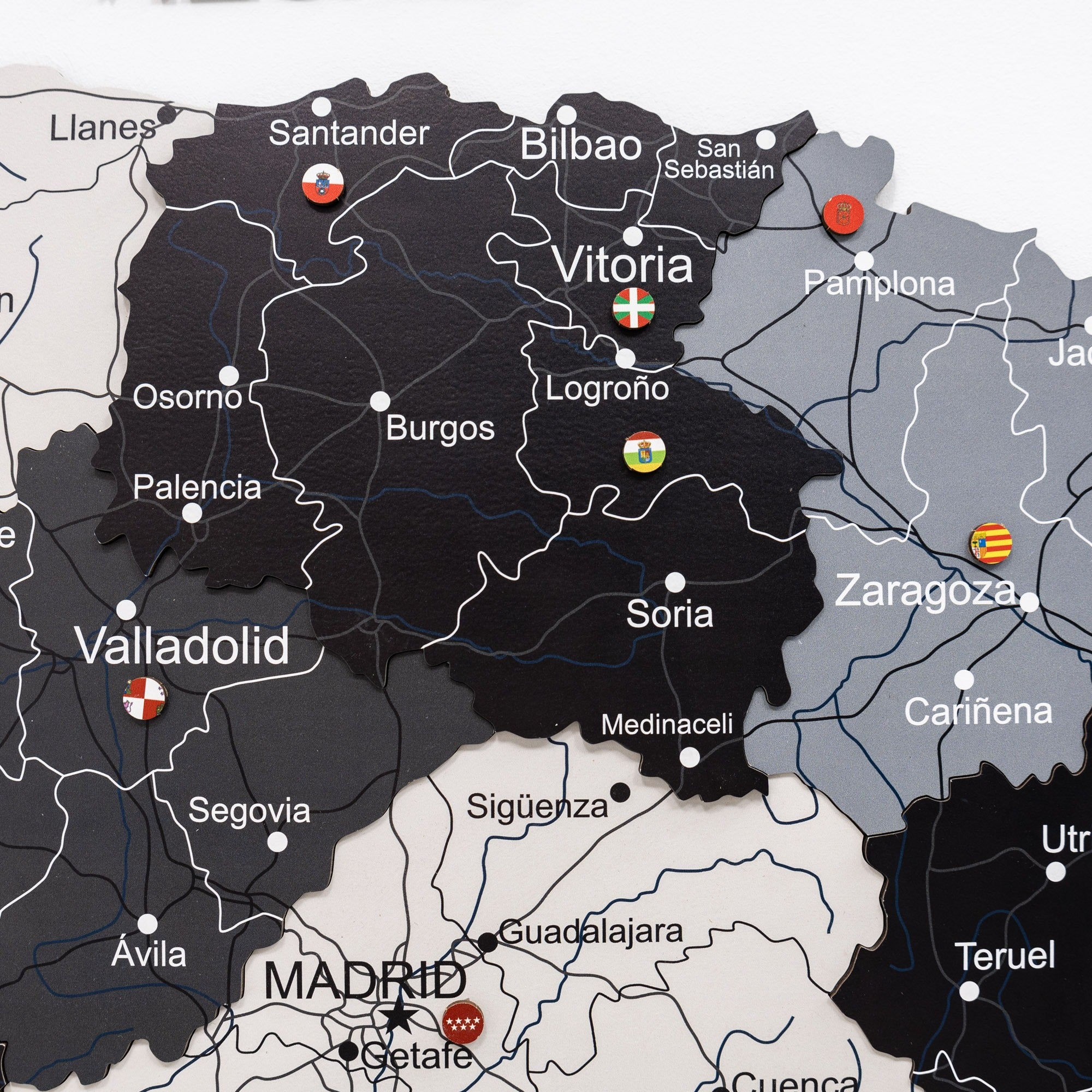 Map of Spain with various cities labeled and small flags indicating different countries.