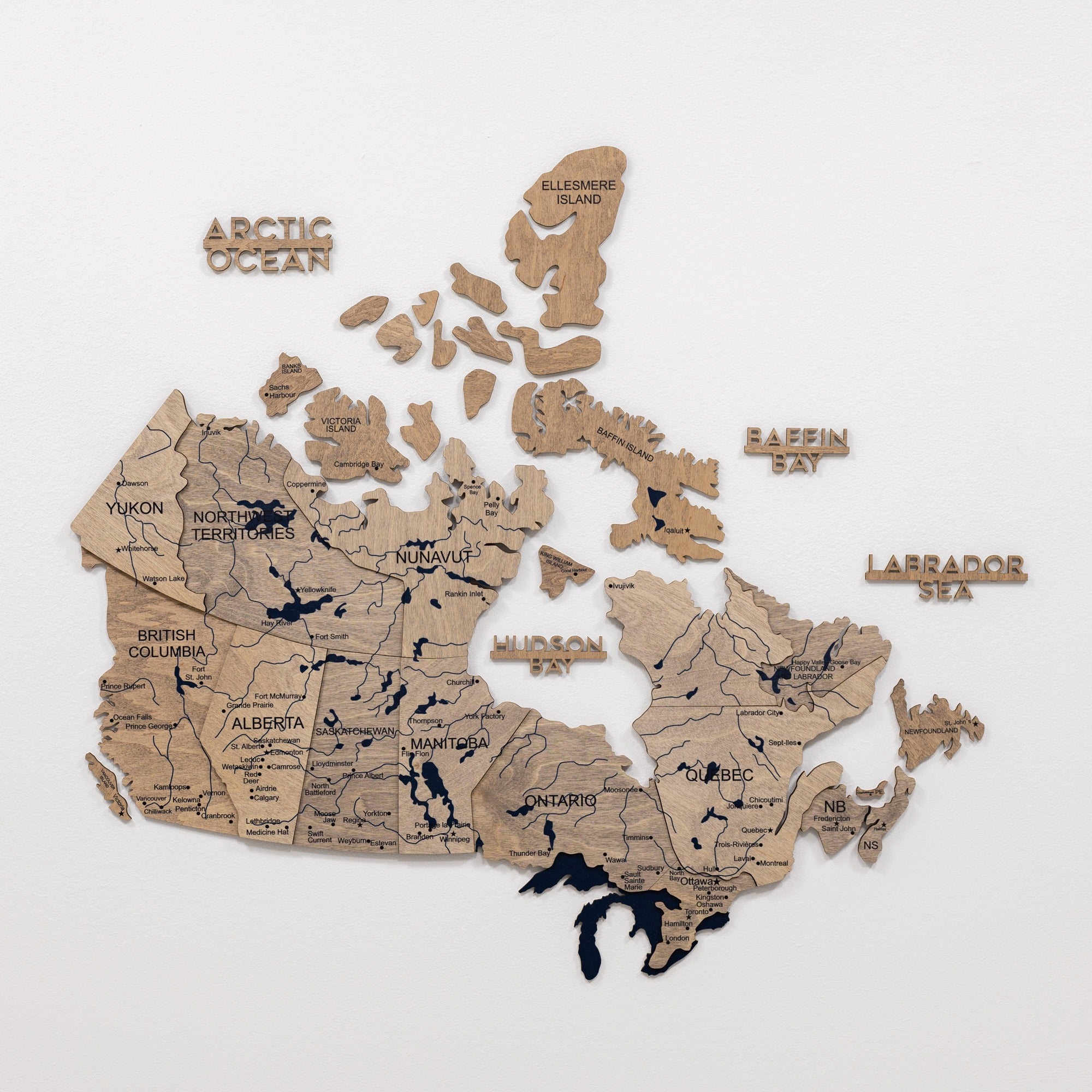 Wooden map of Canada on a white background