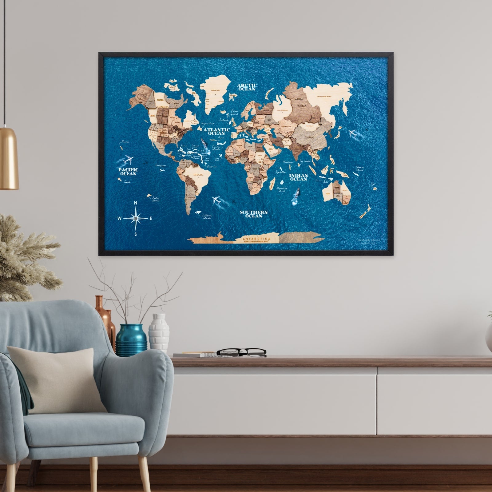World map poster on a wall in a living room setting