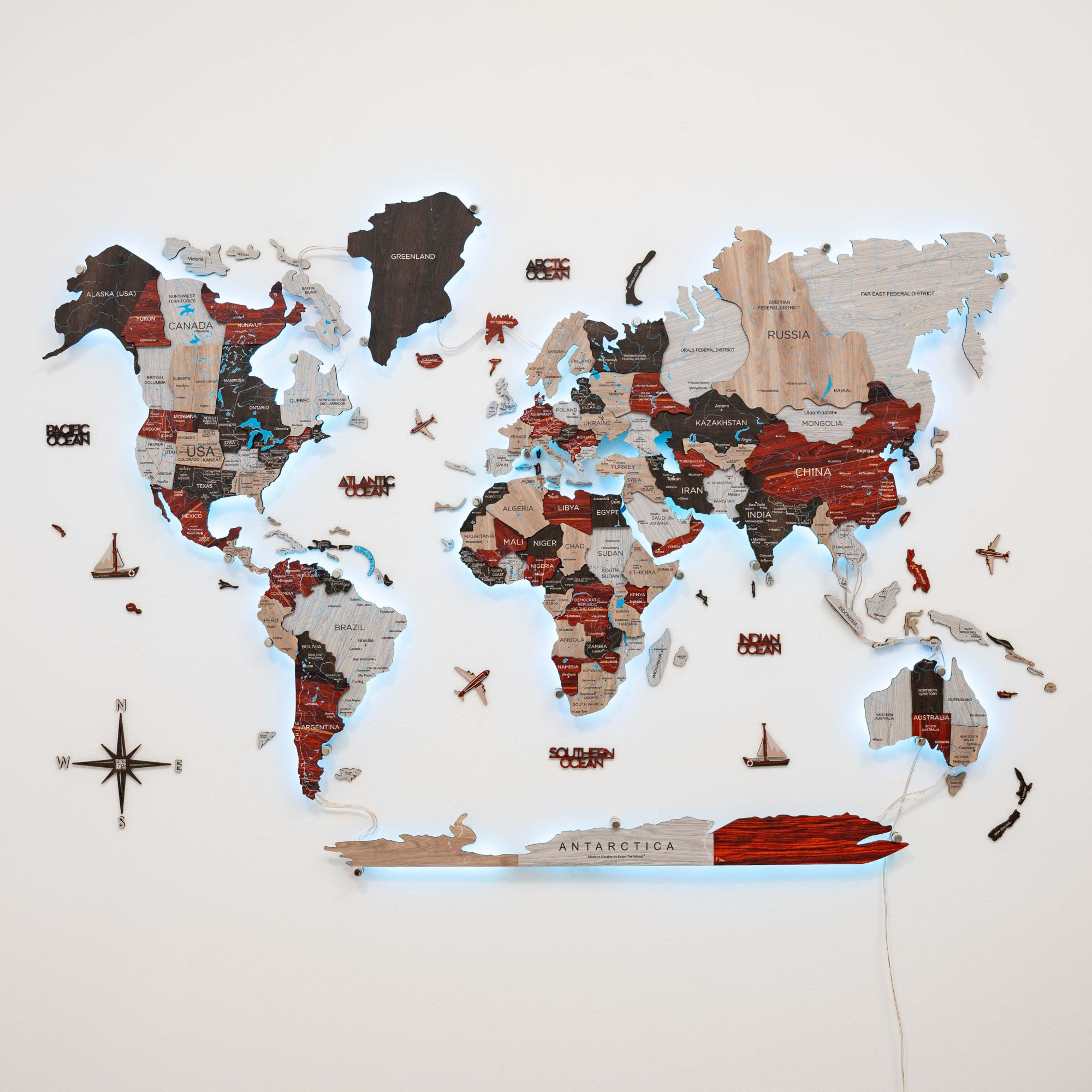 World map with country names and flags on a light background