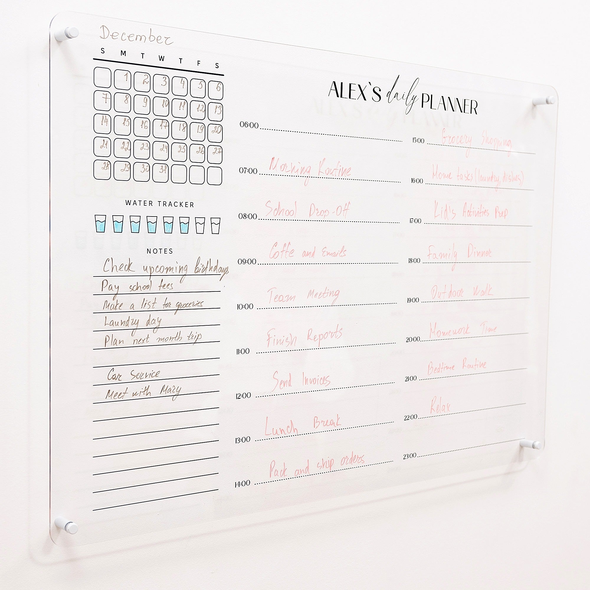Daily planner with a calendar and handwritten notes on a white background