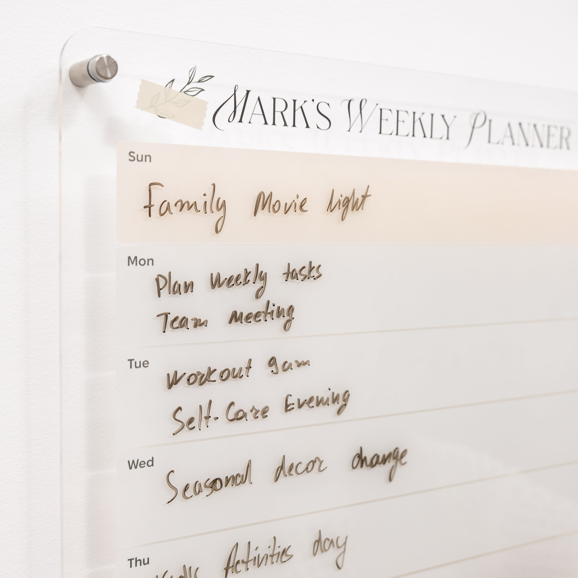 Weekly planner with handwritten tasks on a white background