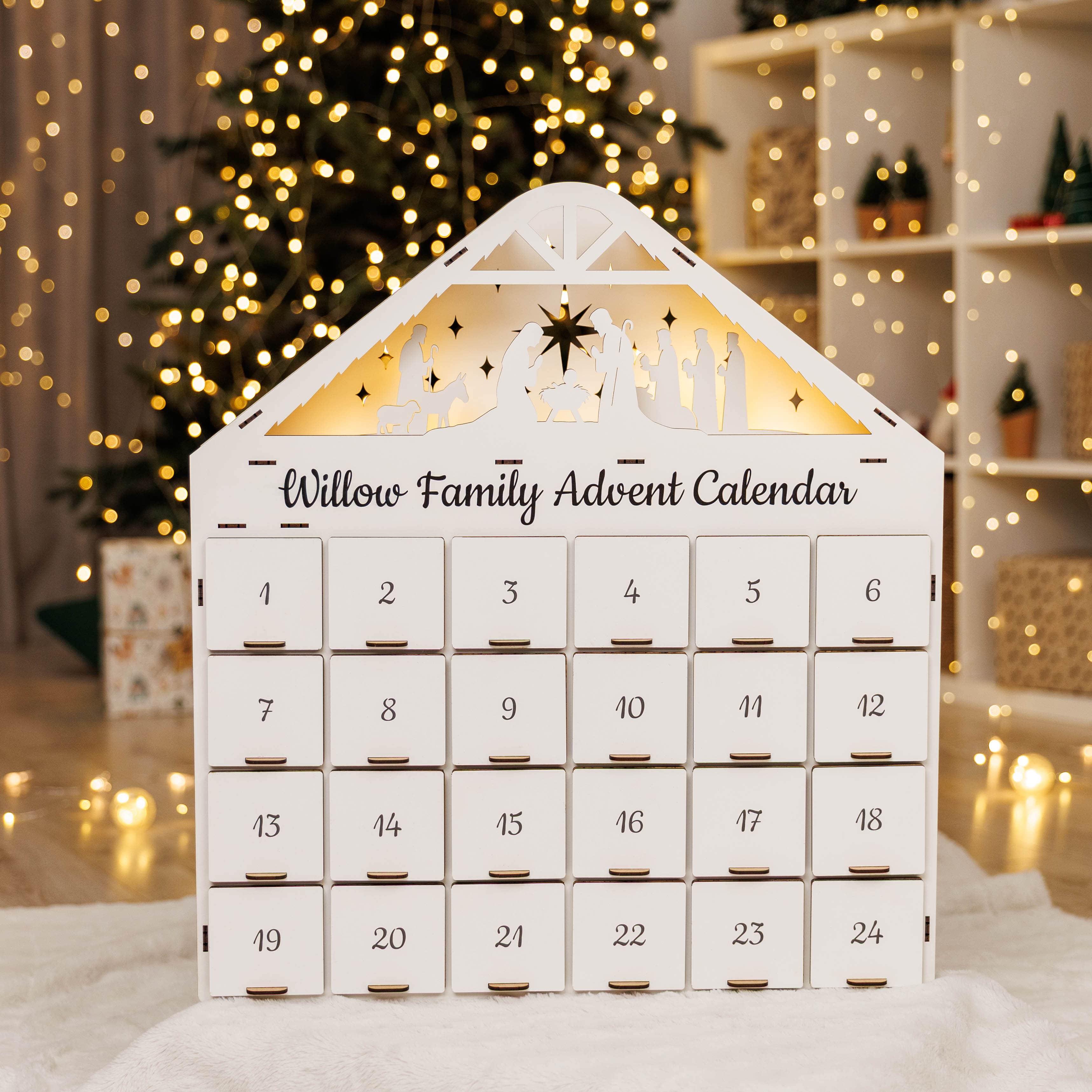 Willow Family Advent Calendar with Christmas tree and decorations in the background