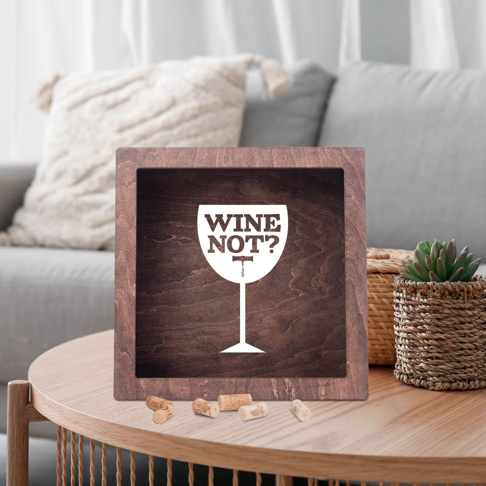 Wooden cork holder with “Wine Not?” engraved design on dark walnut wood.