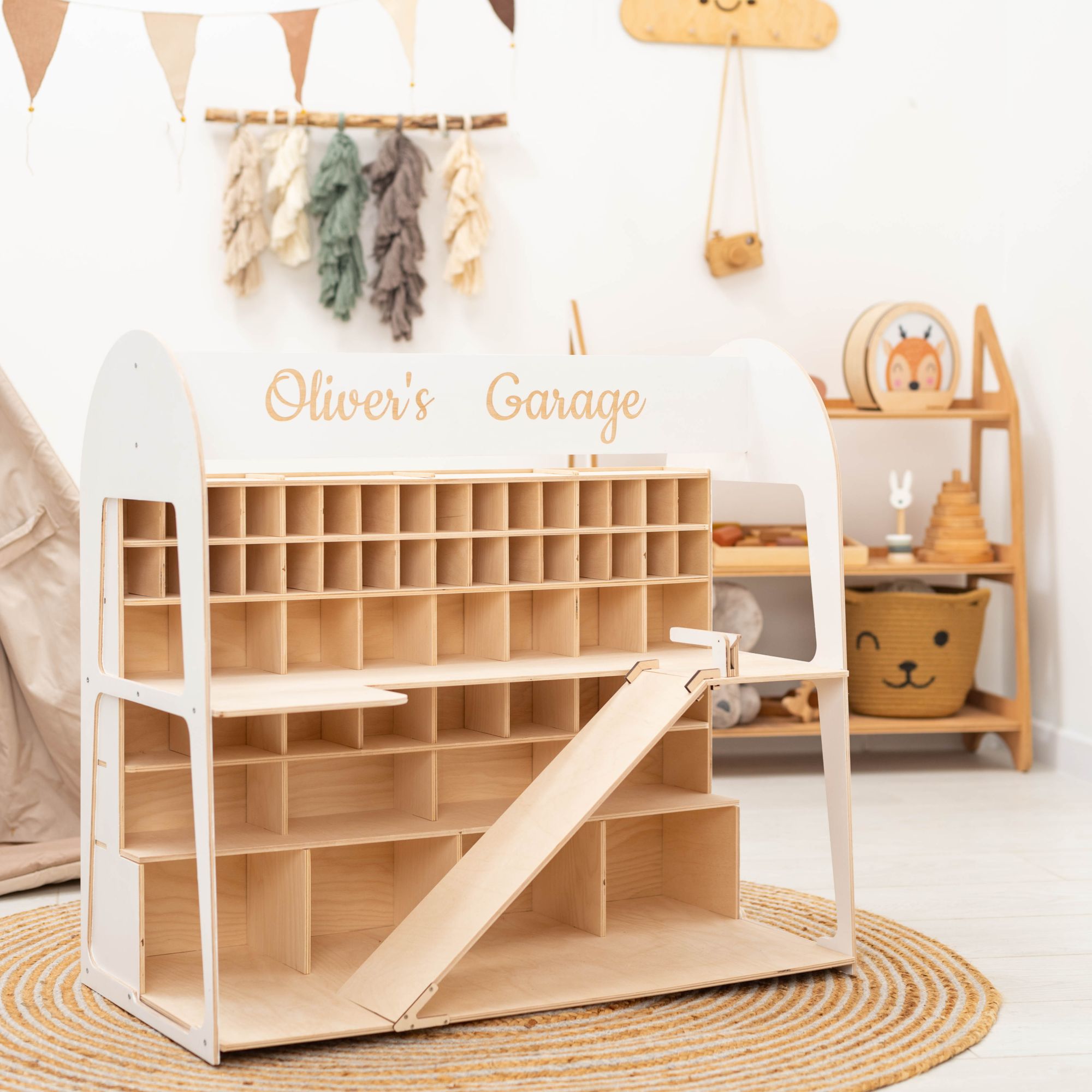 Montessori style toy organizer with cars and ramp