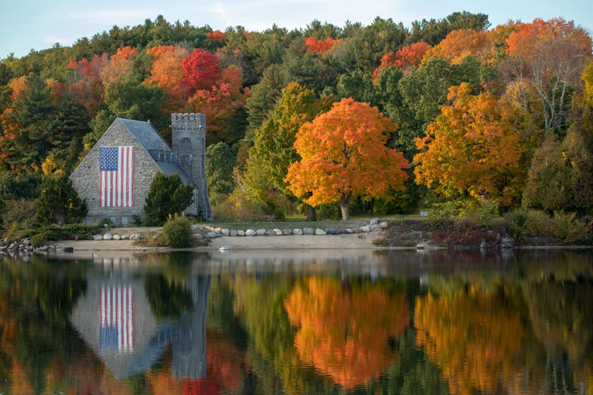 Gray concrete castle near the body of water