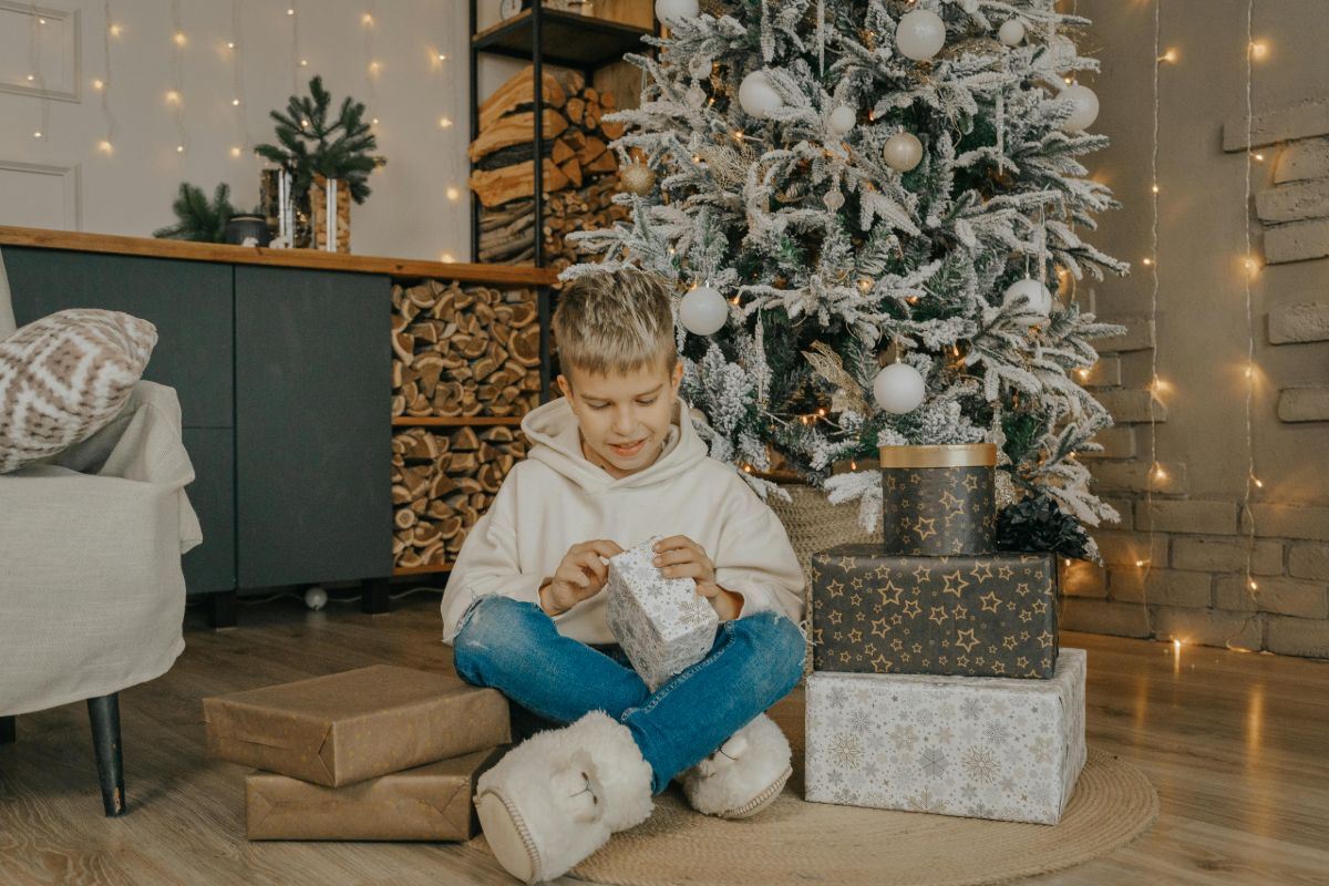 A boy opening a present