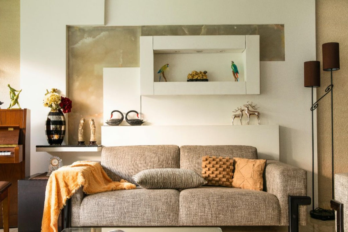 Gray couch with throw pillows